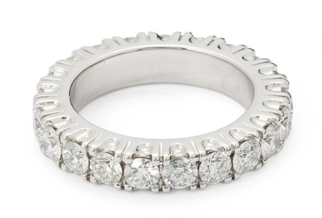 An eternity diamond ring set with numerous brilliant-cut diamonds