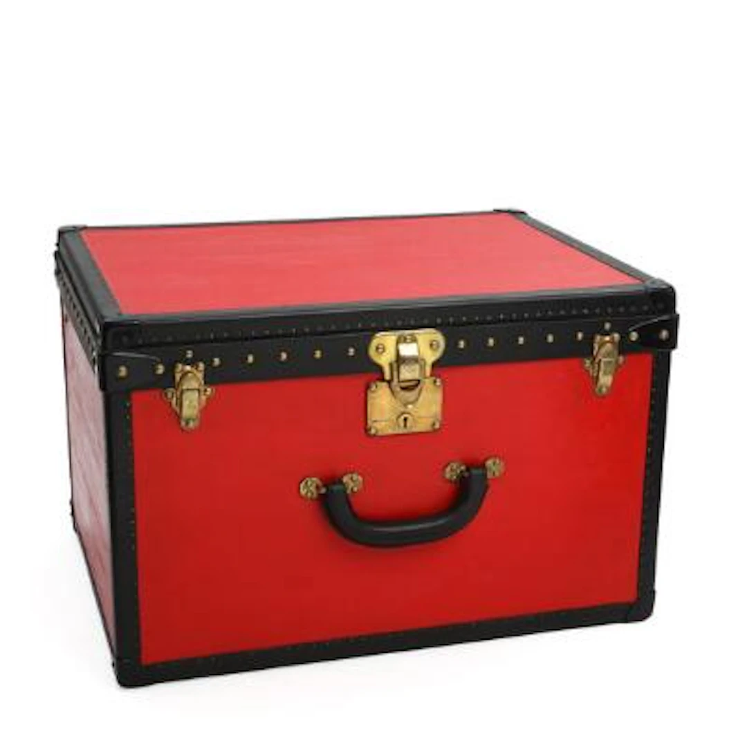 Louis Vuitton: A painted canvas covered trunk. Early 20th century.