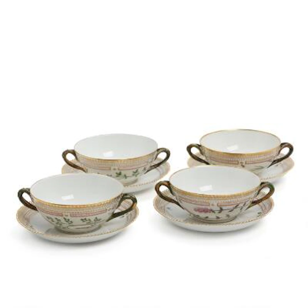 "Flora Danica". Set of four porcelain bouillon cups and saucers. 3612.