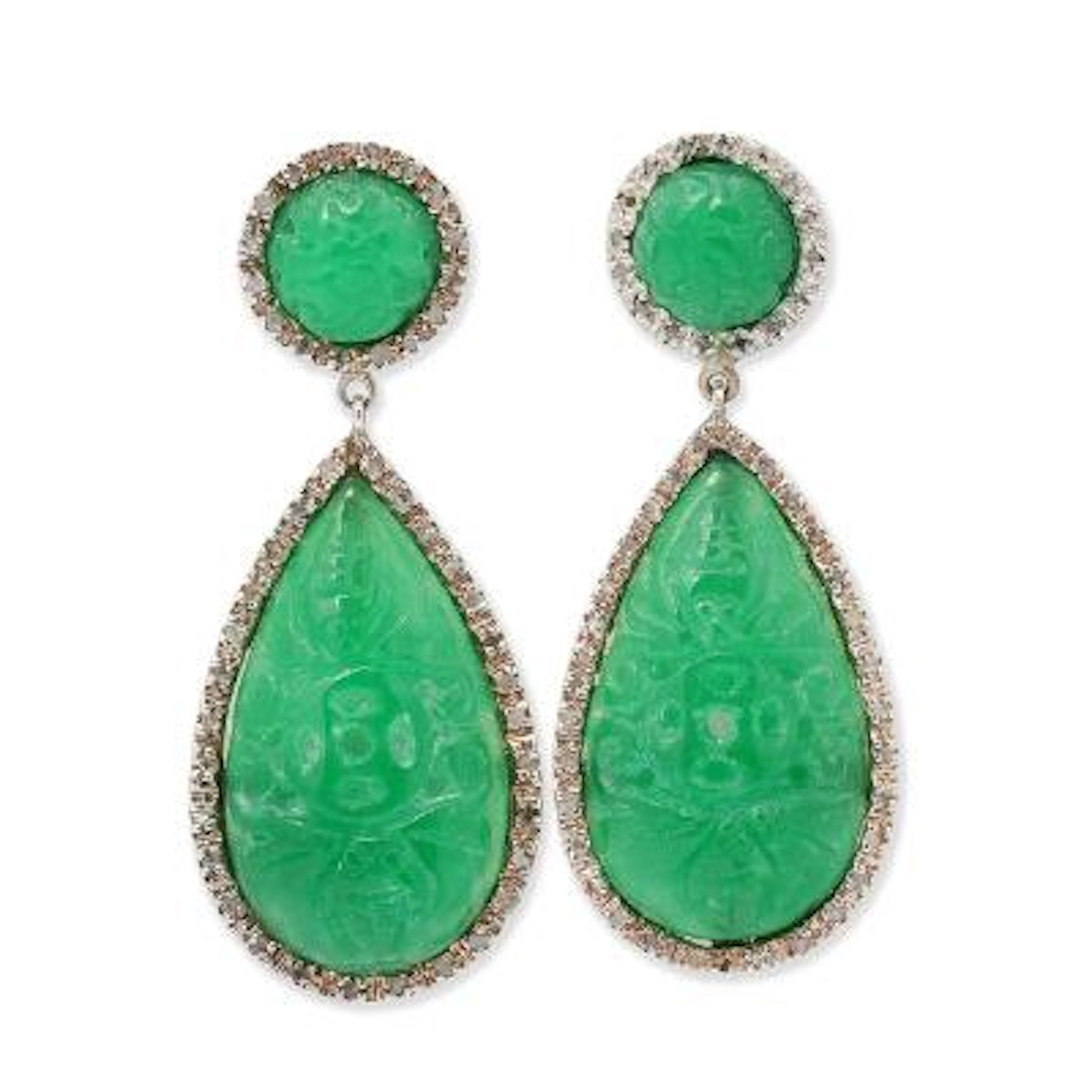 A pair of jade ear pendants set with jade encircled by diamonds mounted
