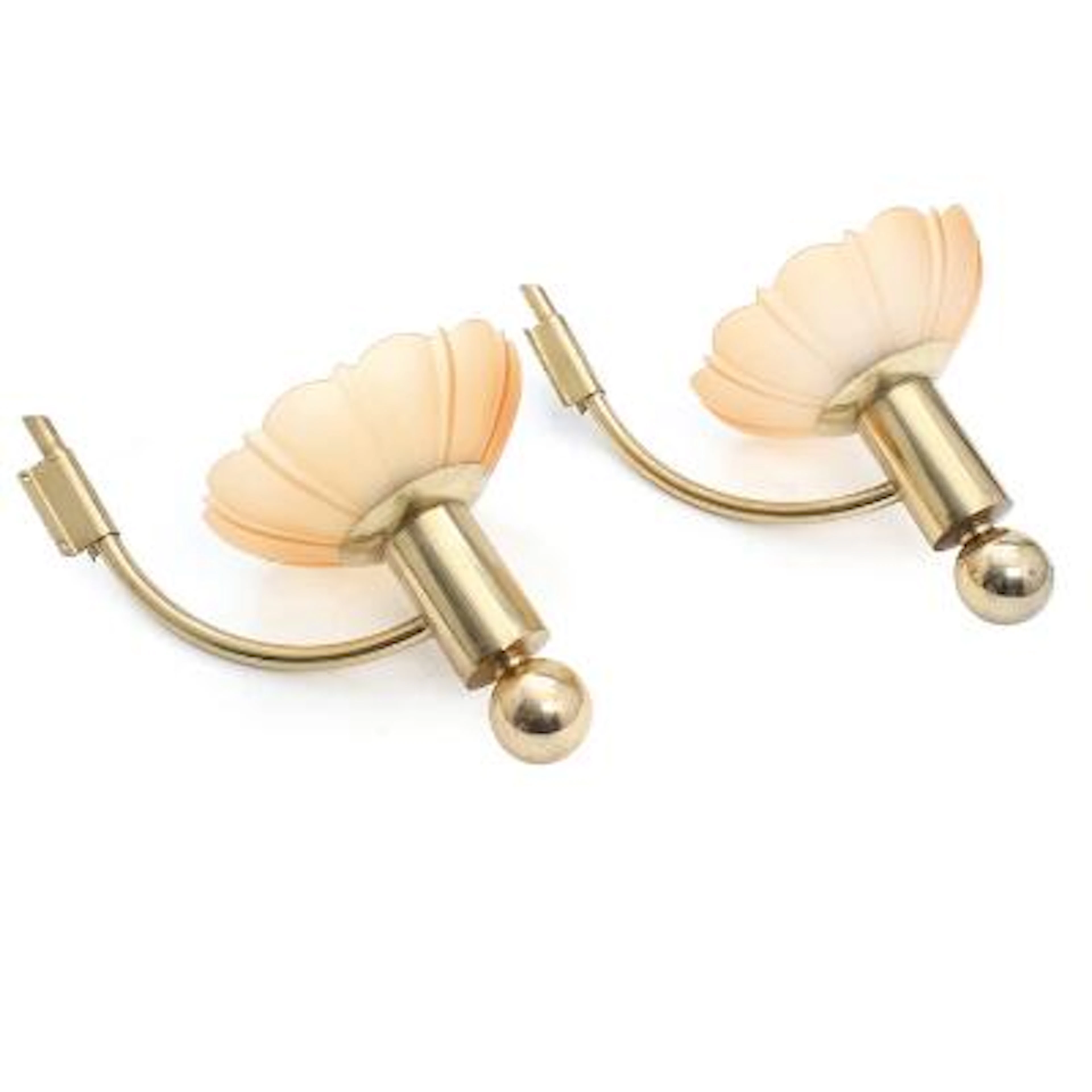 Swedish design: Pair of brass wall lamps with amber glass shades.