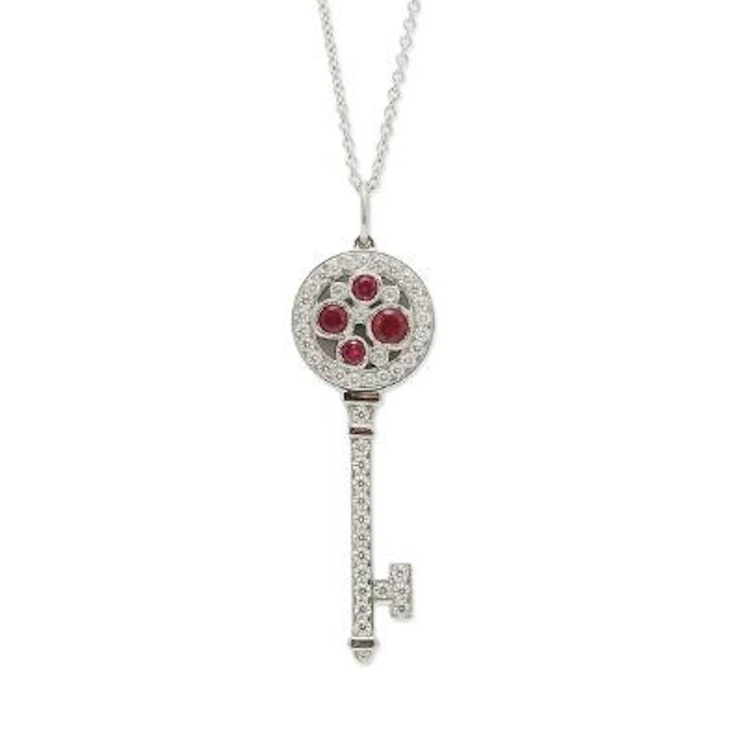 Tiffany & Co.: A "Cobblestone Key" pendant set with rubies and diamonds