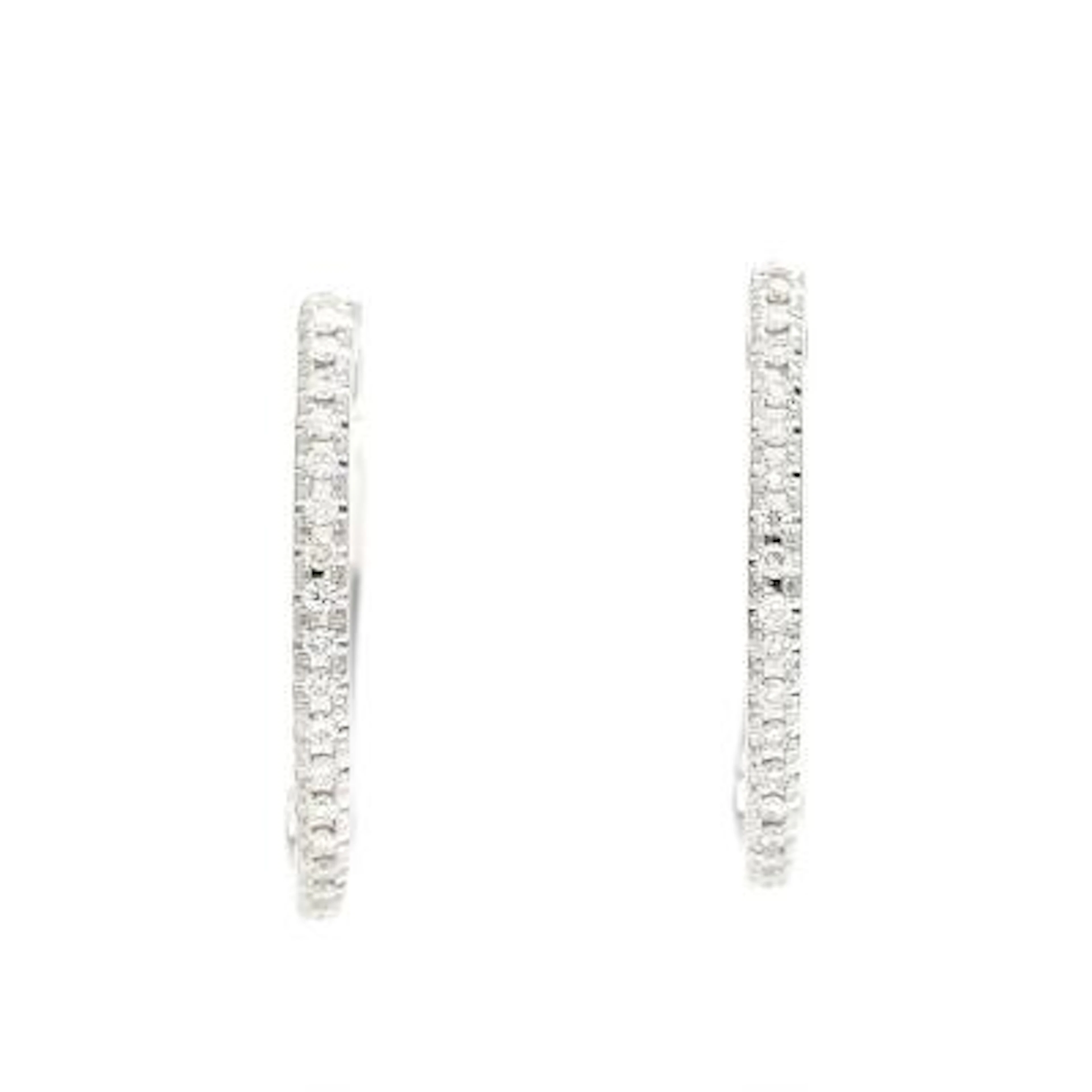 A pair of diamond ear hoops set with brilliant-cut diamonds weighing