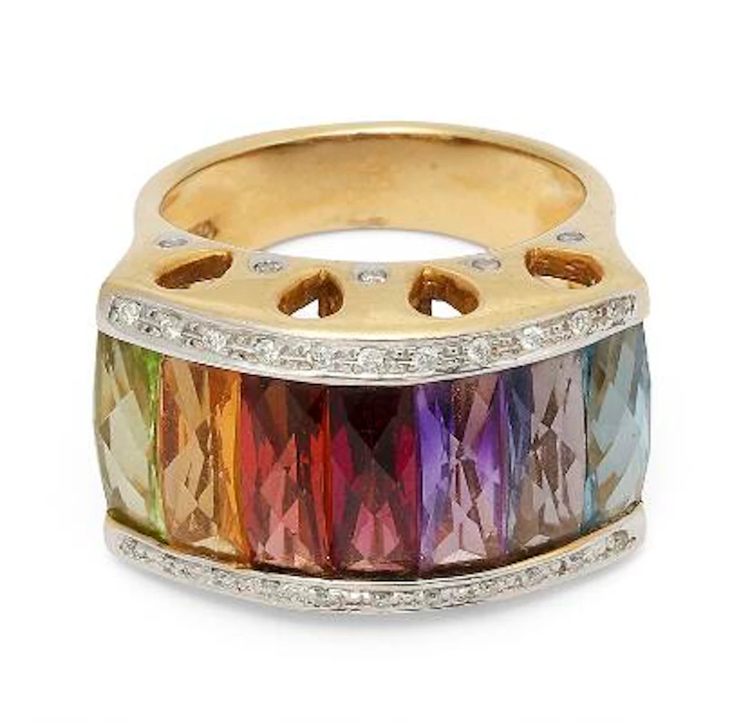 A ring set with multicoloured fancy-cut stones including topaz, amethyst