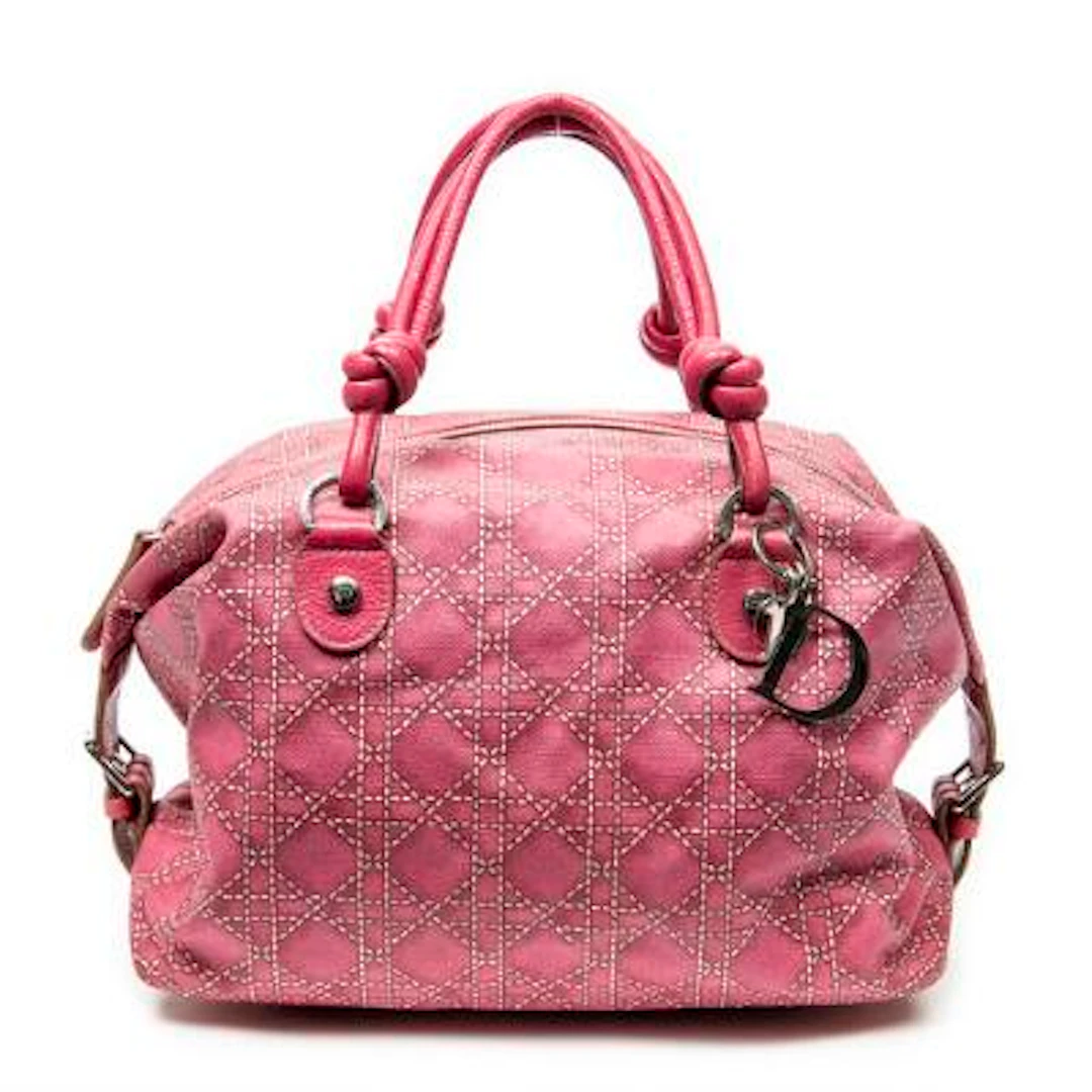 Christian Dior: A "Knot Cherie Boston" bag in pink/printed canvas