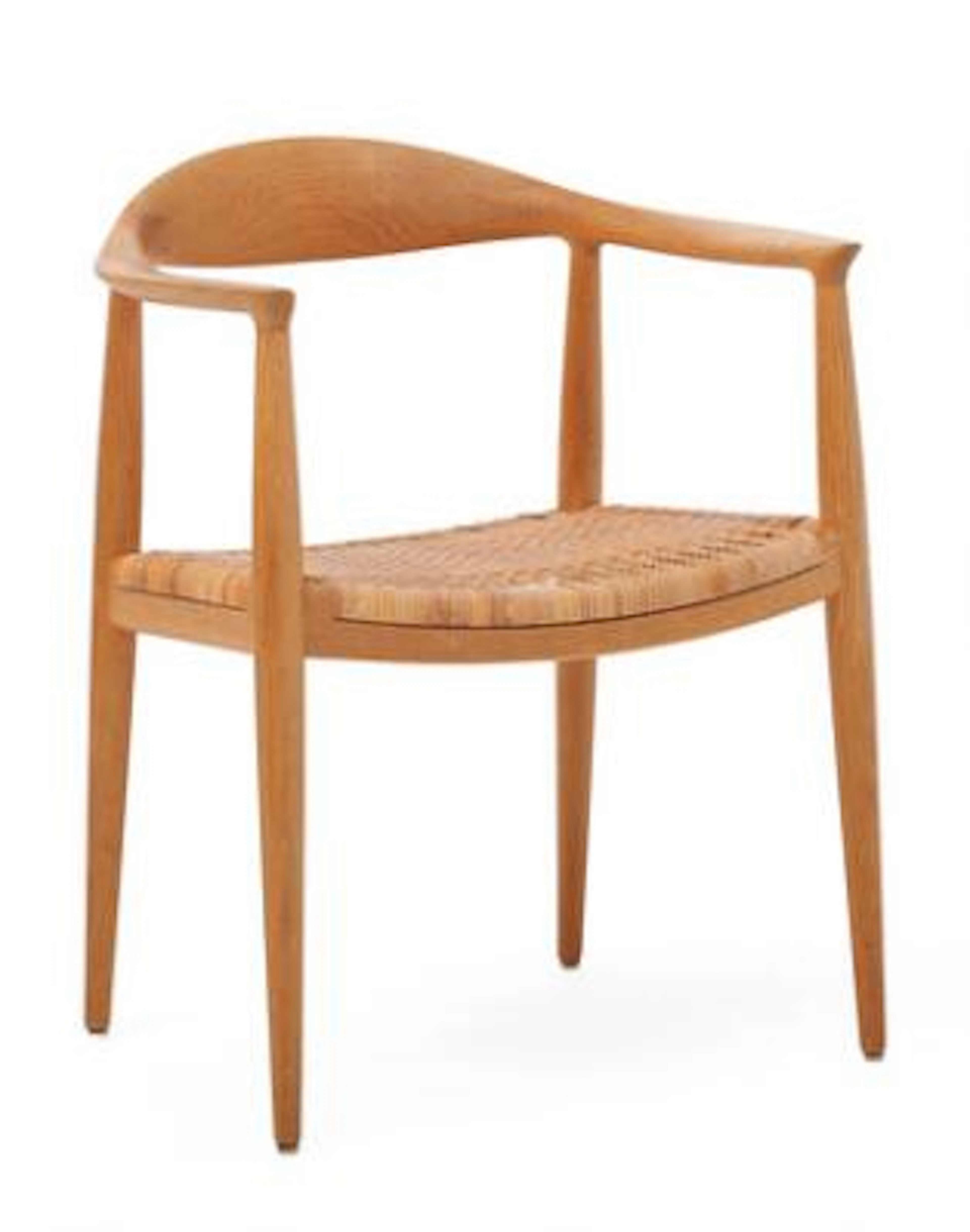 Hans J. Wegner: “The Chair”. Oak armchair. Seat with woven cane. Model