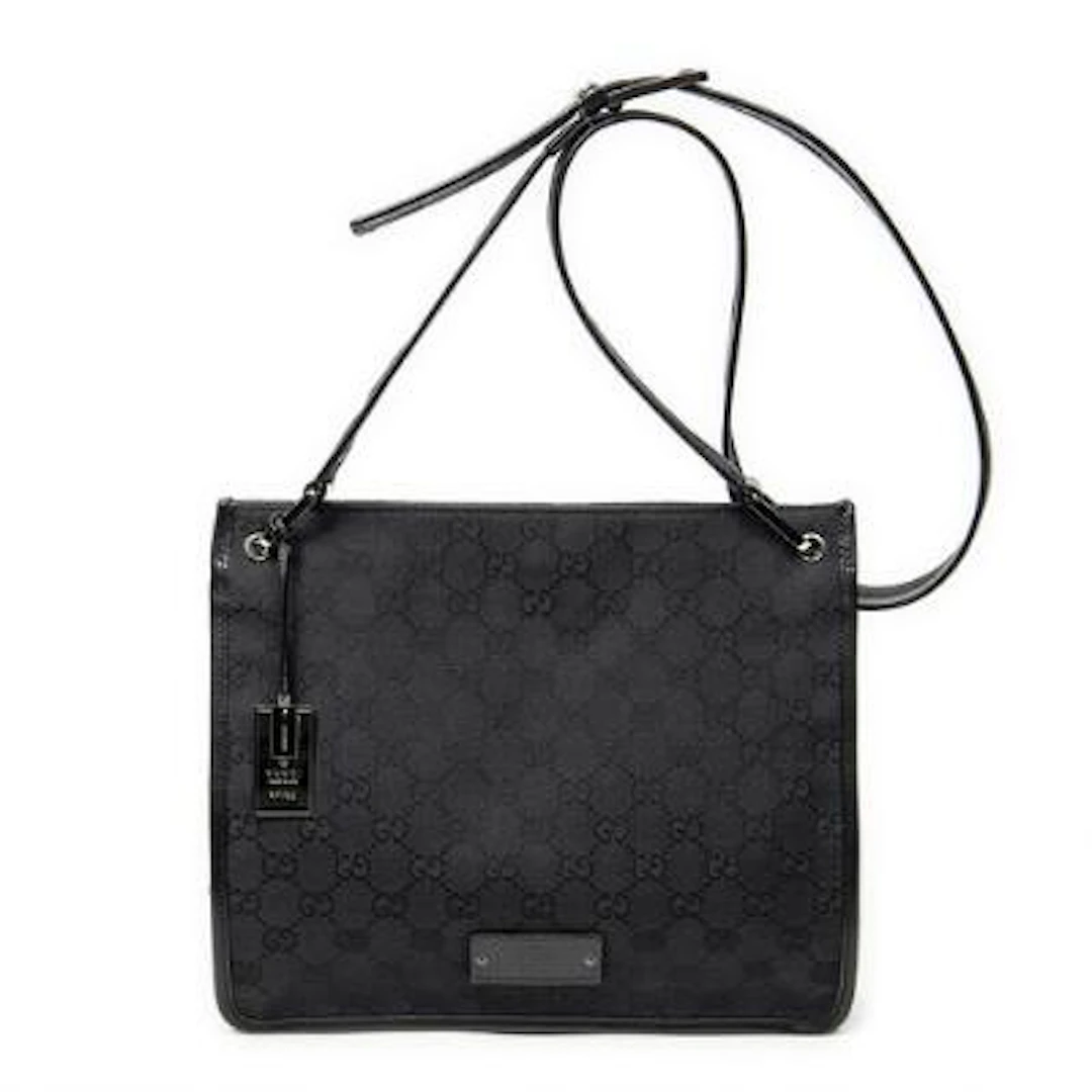 Gucci: A "Small Messenger Crossbody" bag in black monogram canvas
