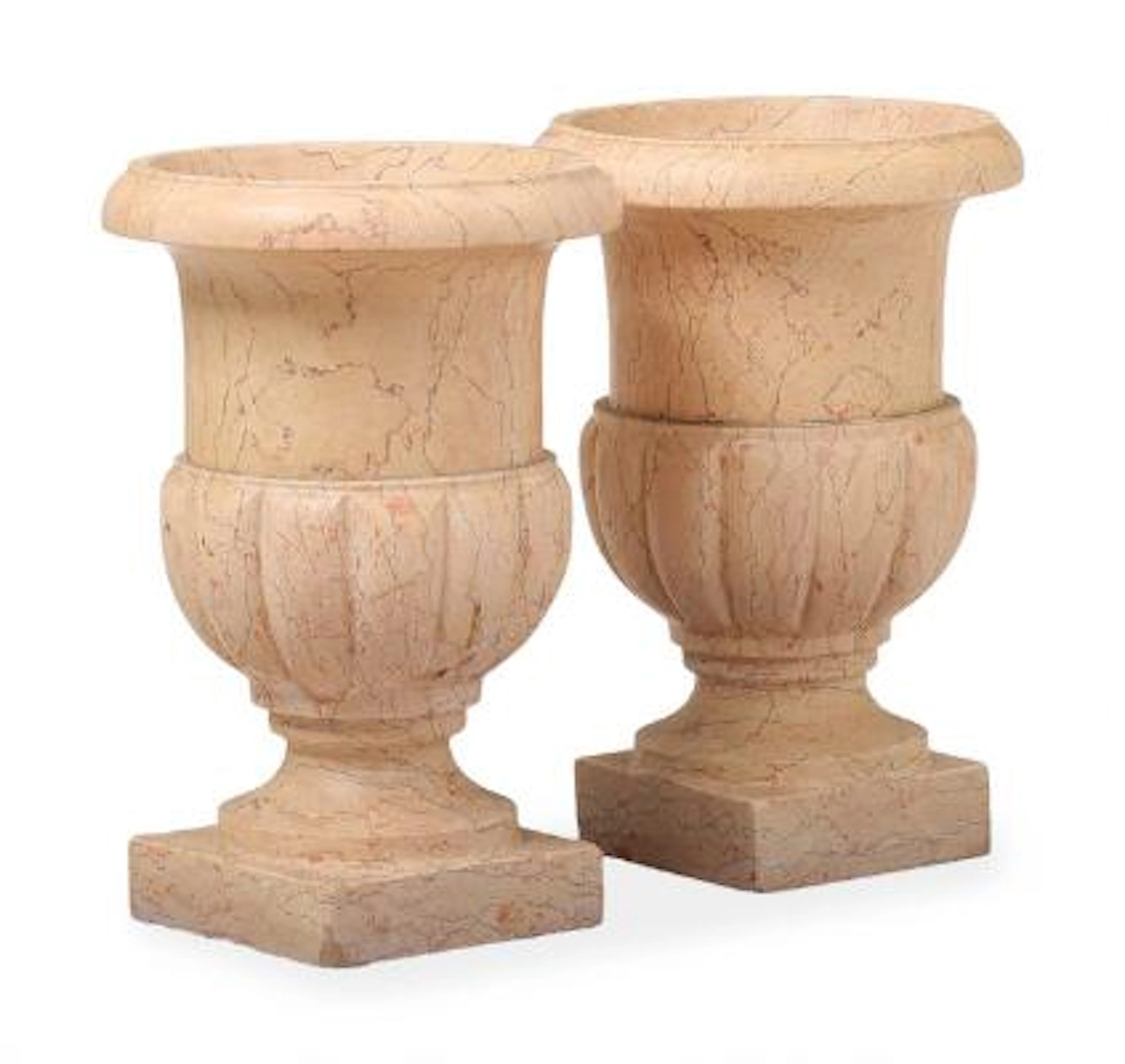 A pair of garden urns in composite, baluster-shaped on four-sided