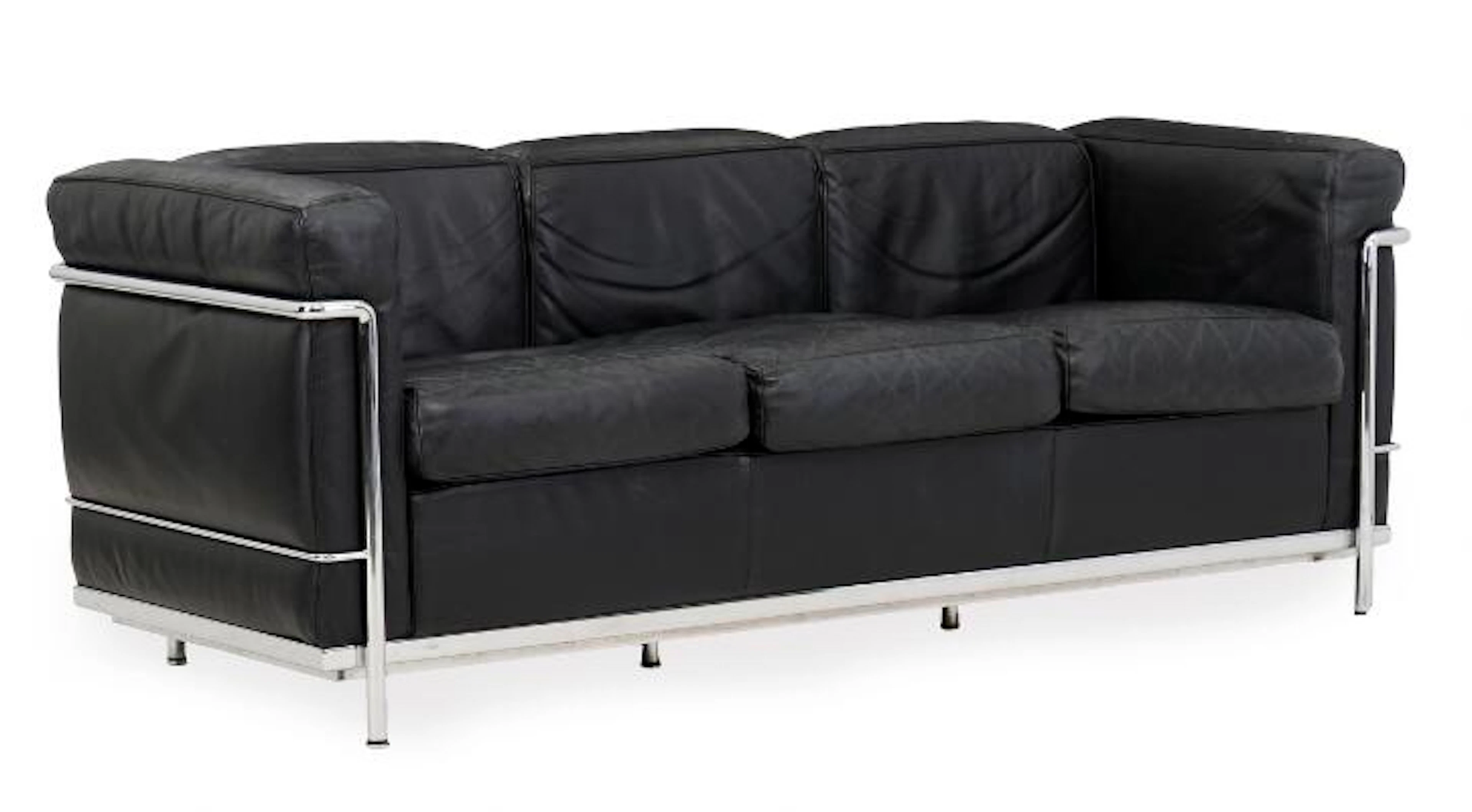 Le Corbusier: "LC 2". Freestanding three-seater sofa with frame of
