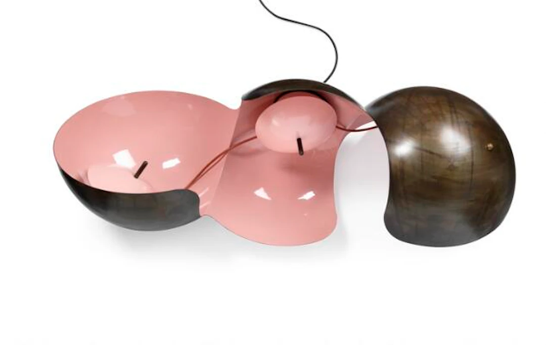 Konrad Friedel: Sculptural steel floor lamp. Interior painted pink.