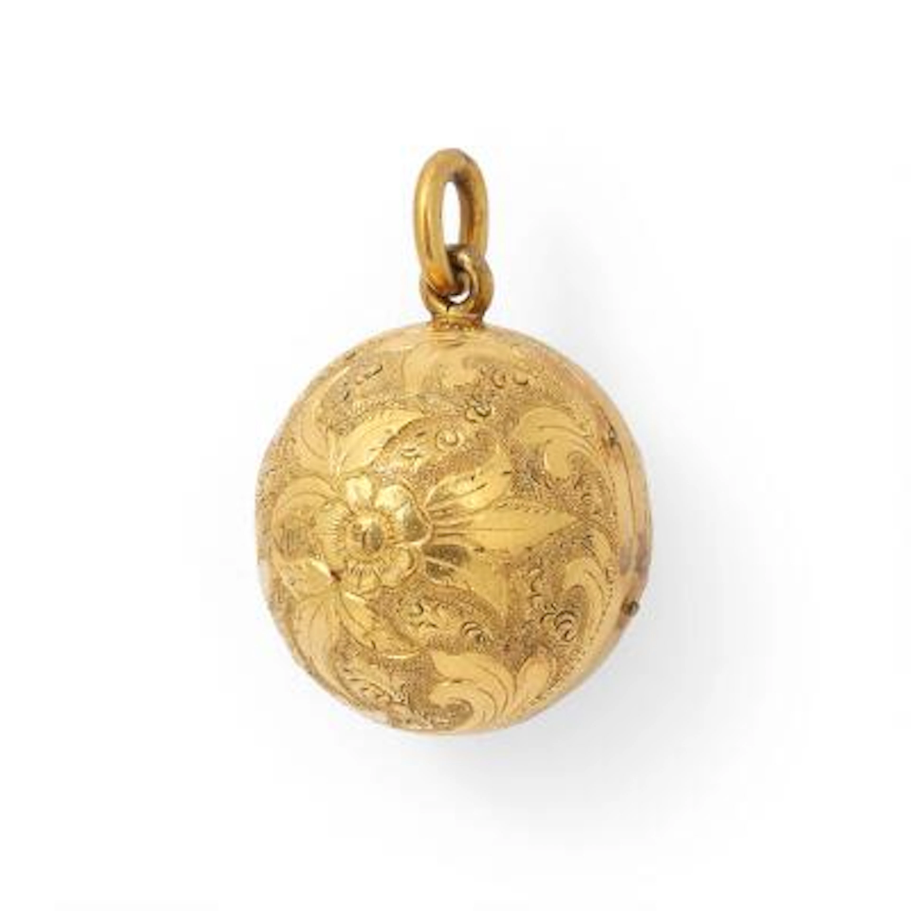 A gilded pendant in the shape of a spherical locket. Weight app. 5.5