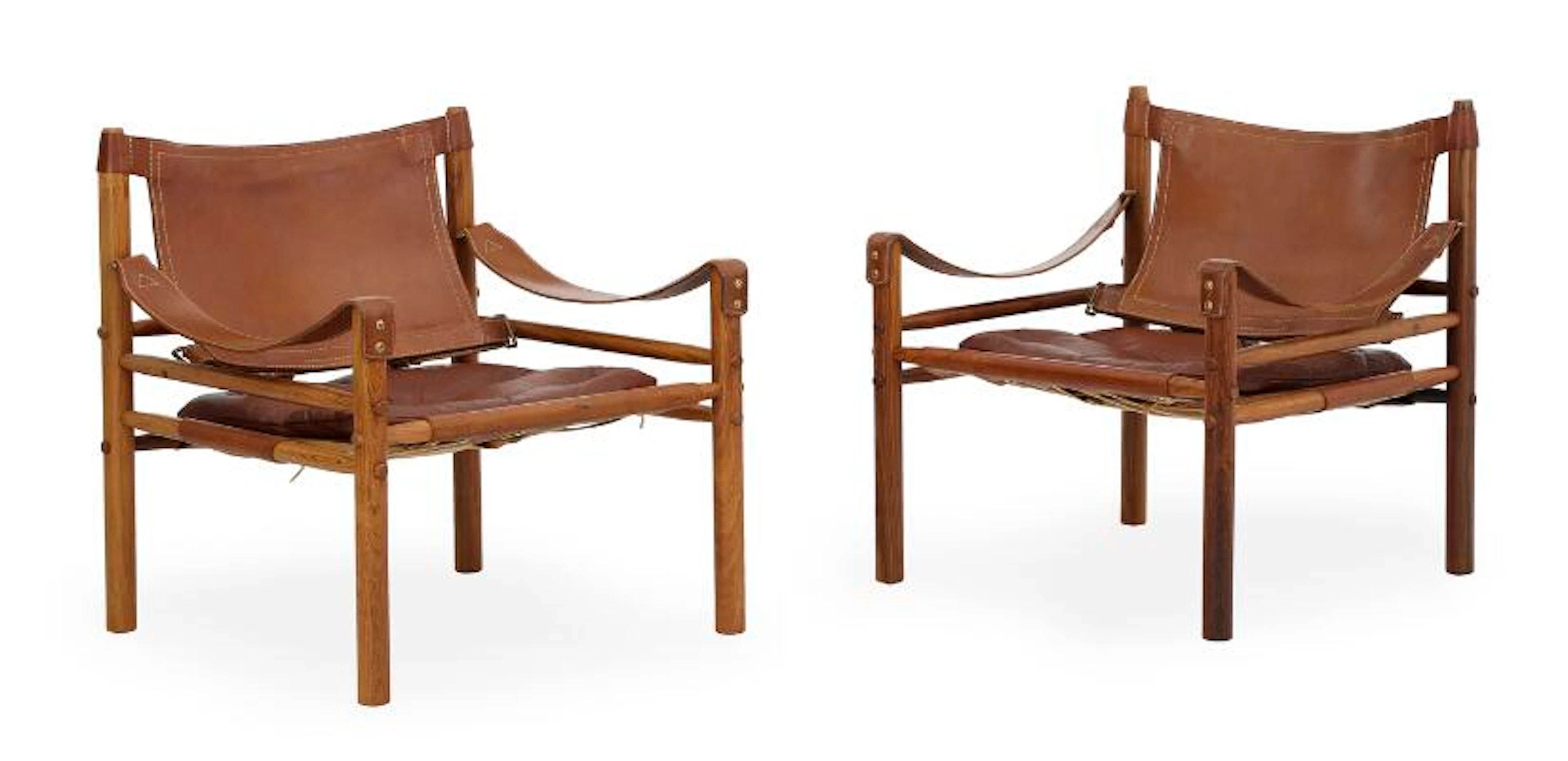 Arne Norell: “Scirocco”. A pair of rosewood easy chairs, seat, back
