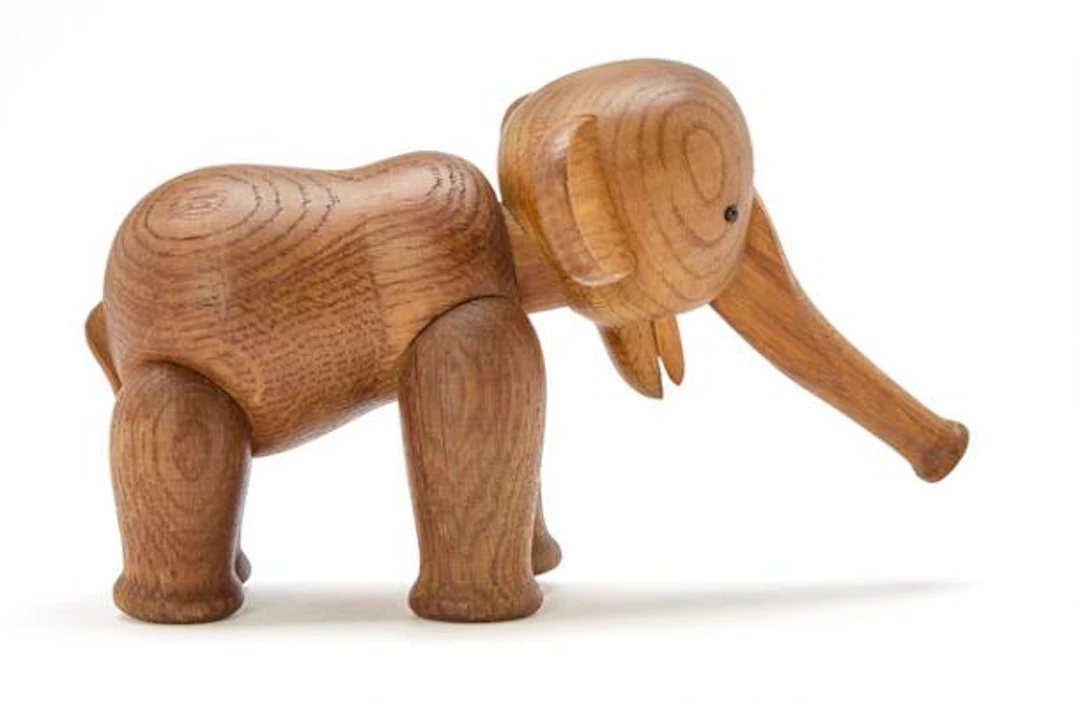 Kay Bojesen: A patinated oak elephant figure with beech tusks. Moveable