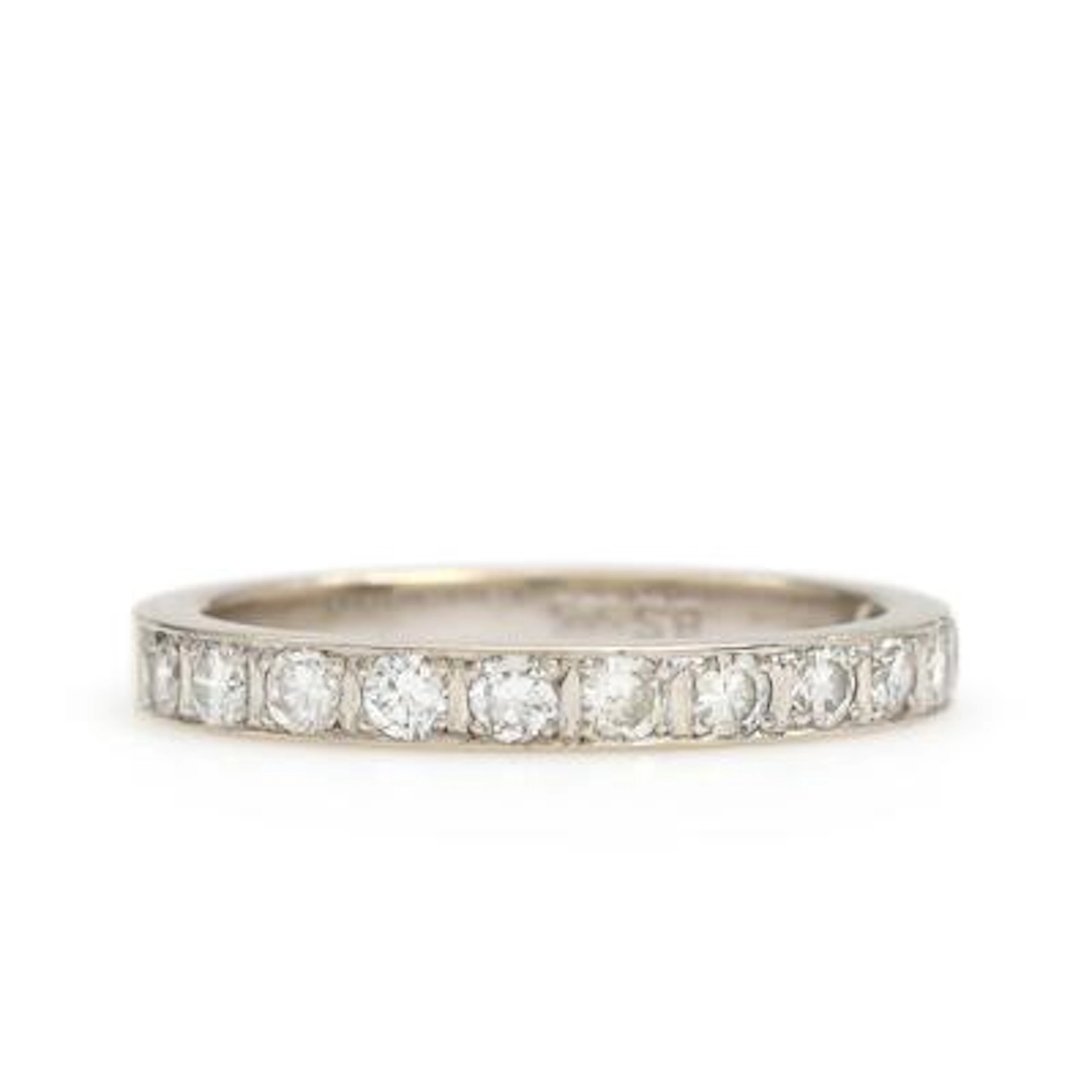 Diamond ring set with numerous diamonds, mounted in 14k white gold.