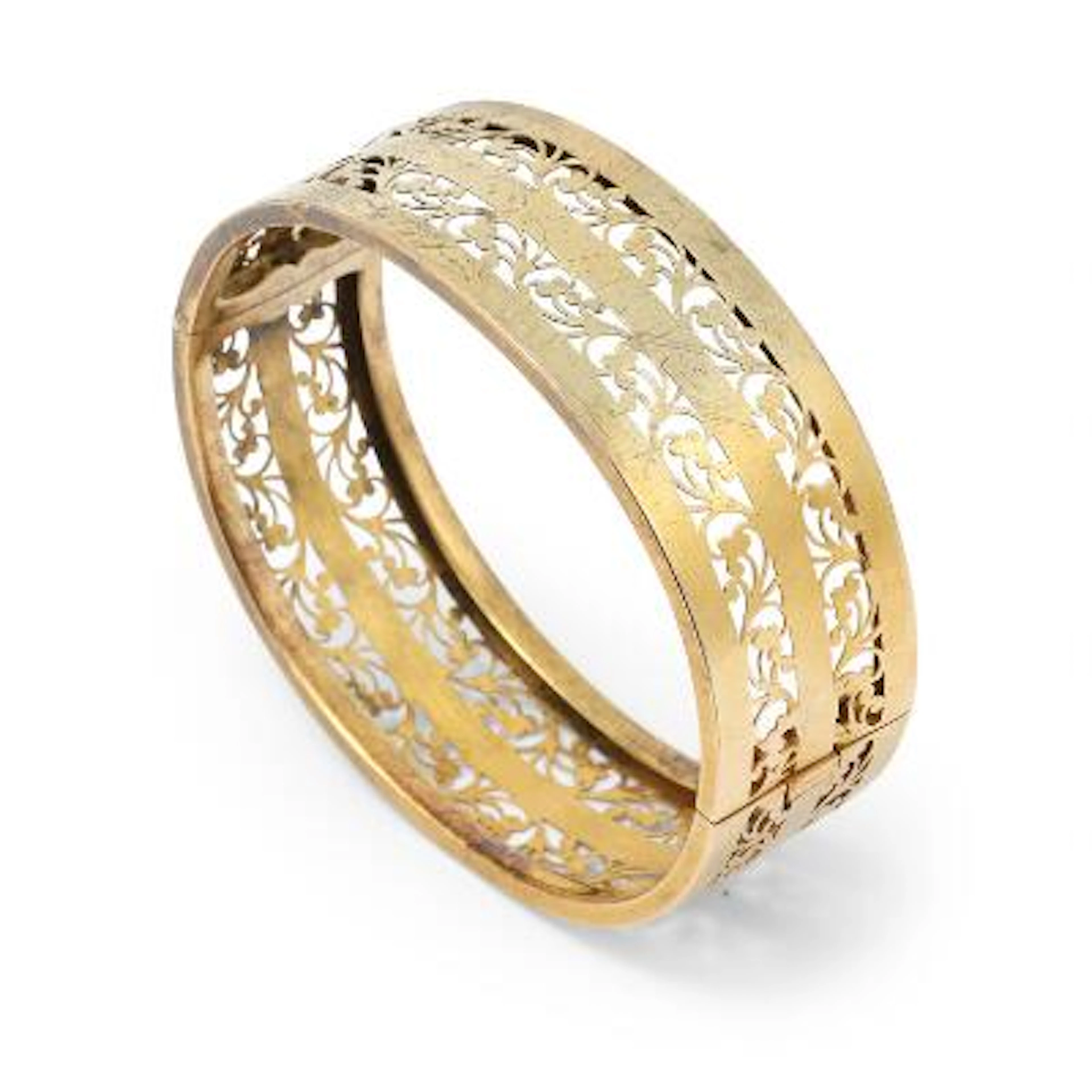 An openable bangle of gold. Weight app. 18.5 g. W. 20 mm. Inner diam.