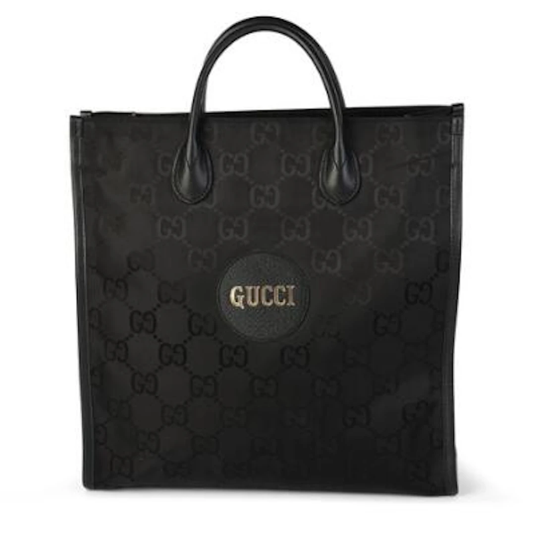 Gucci: An "Off the Grid" tote bag of black monogram canvas and leather
