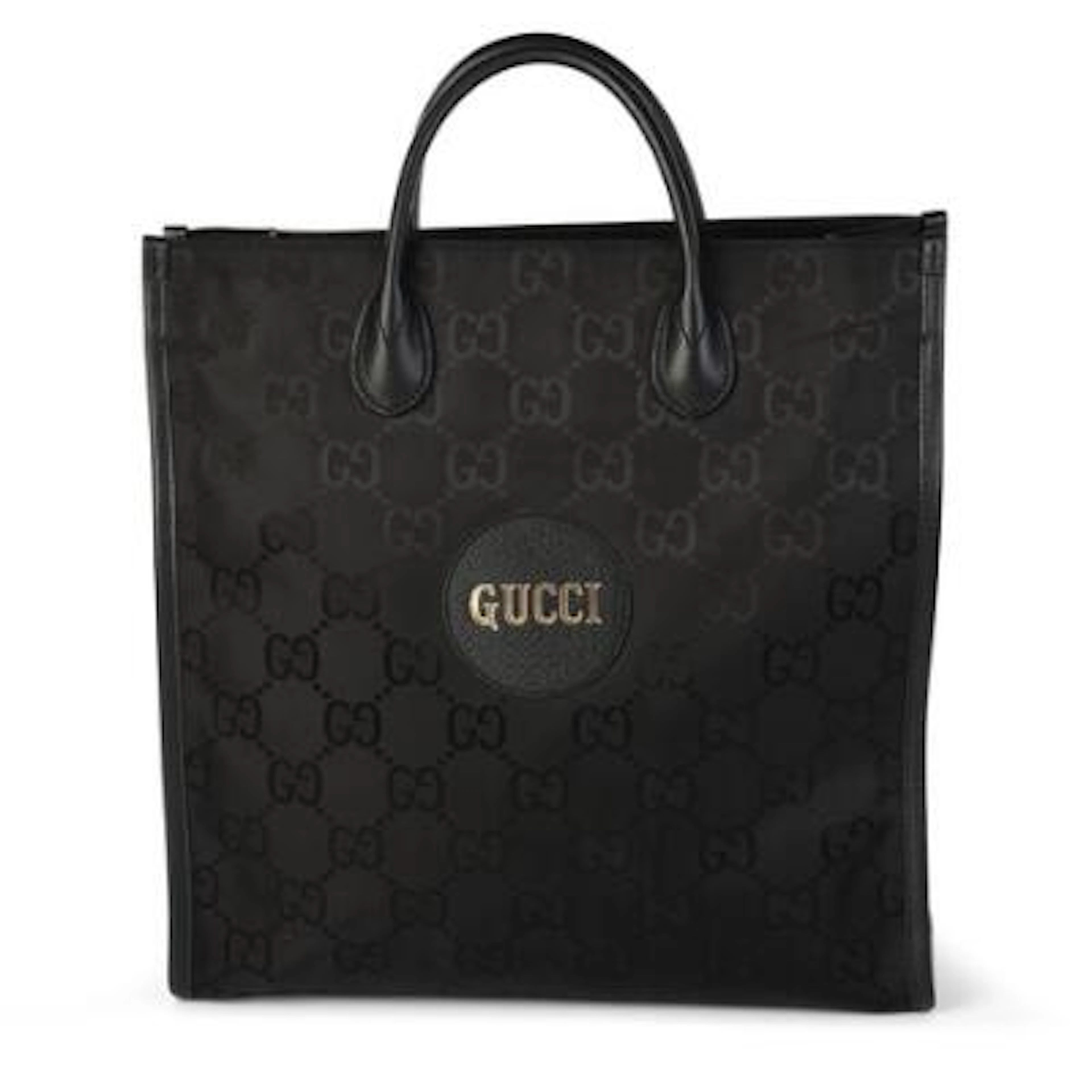 Gucci: An "Off the Grid" tote bag of black monogram canvas and leather
