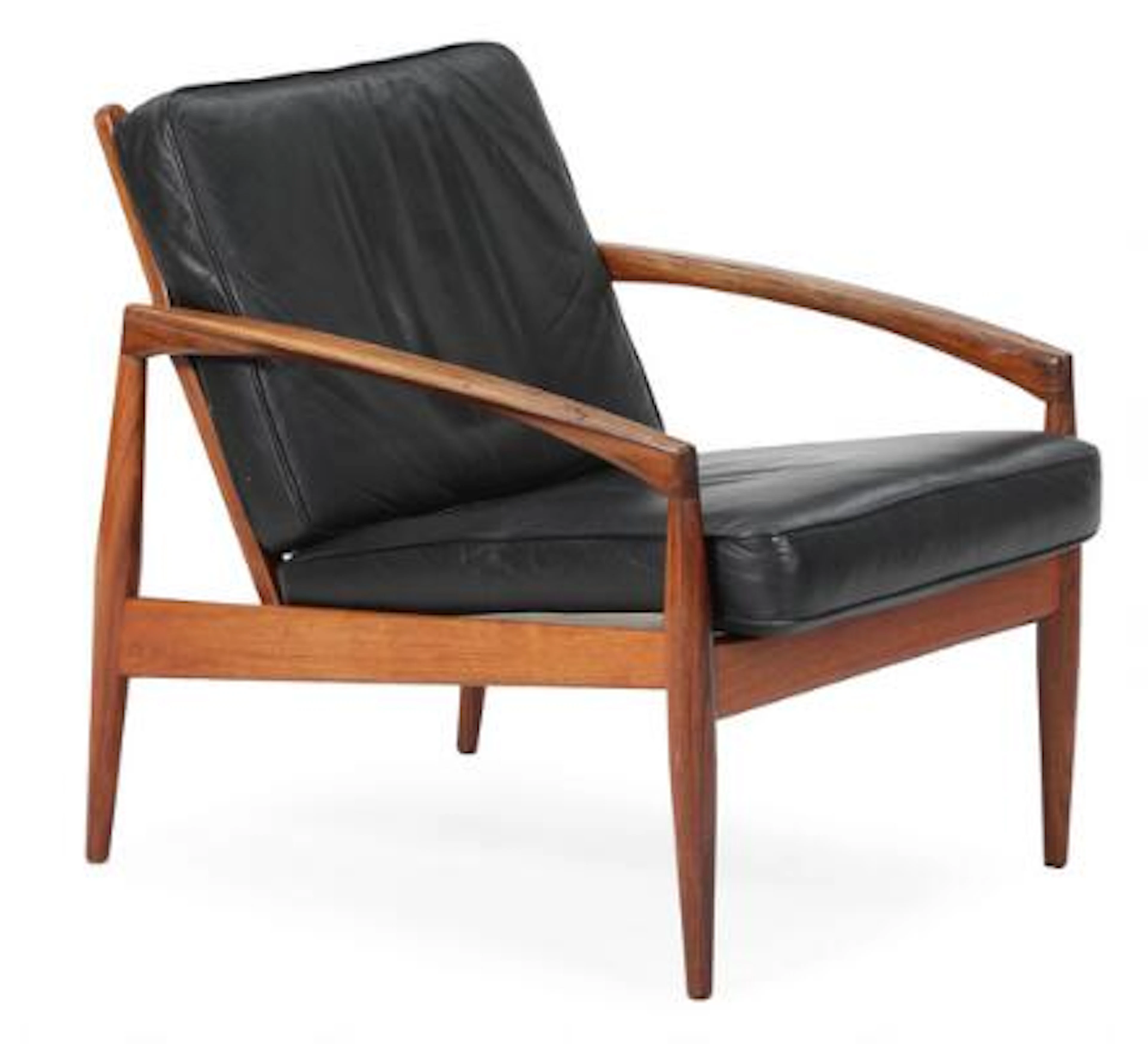 Kai Kristiansen: “The Paper knife”. A rosewood easy chair, loose cushions