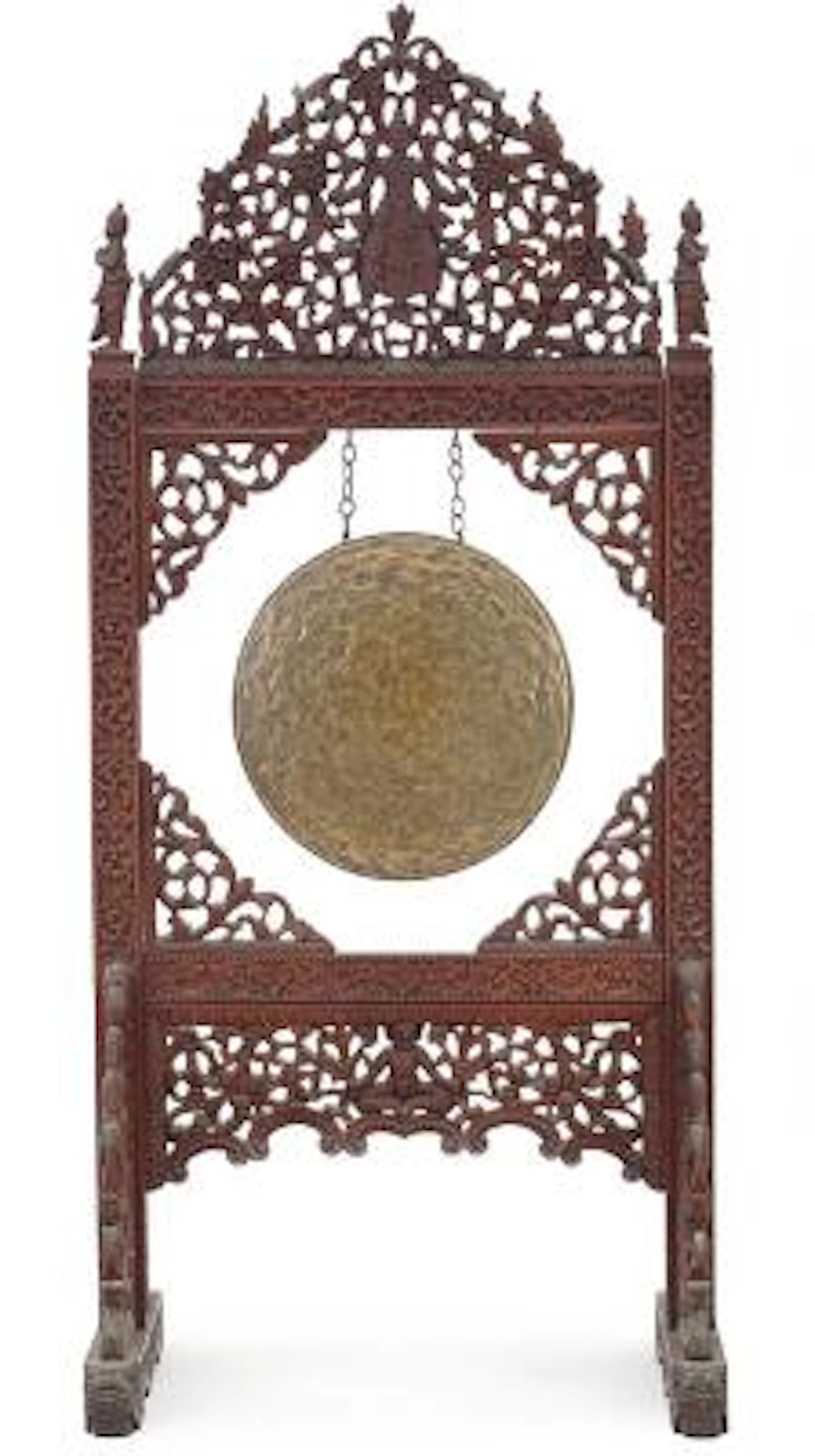 A Thai first half 20th century metal gong and carved hardwood base.