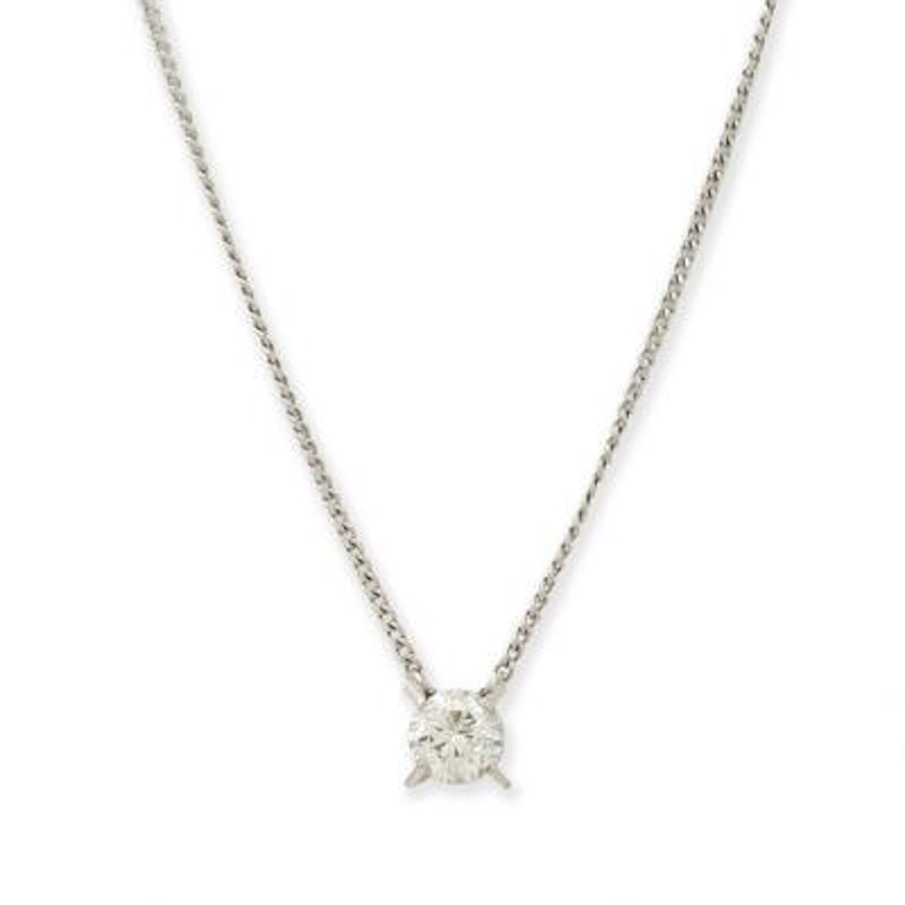 A necklace with a solitaire diamond pendant, mounted in platinum.