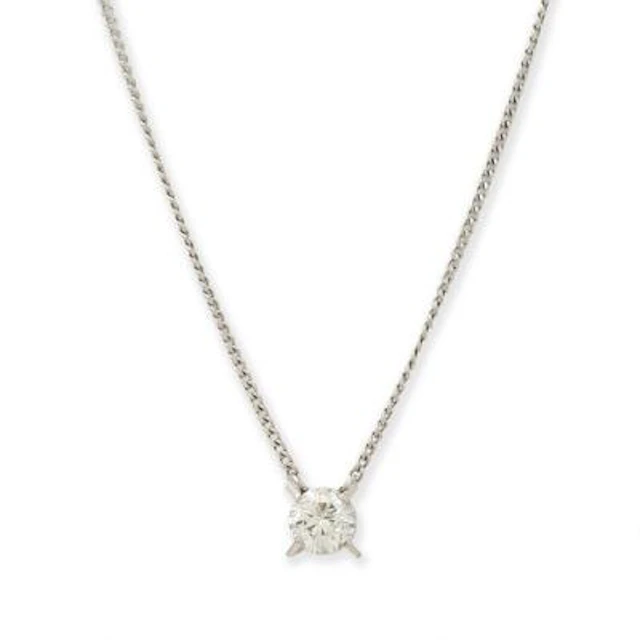 A necklace with a solitaire diamond pendant, mounted in platinum.