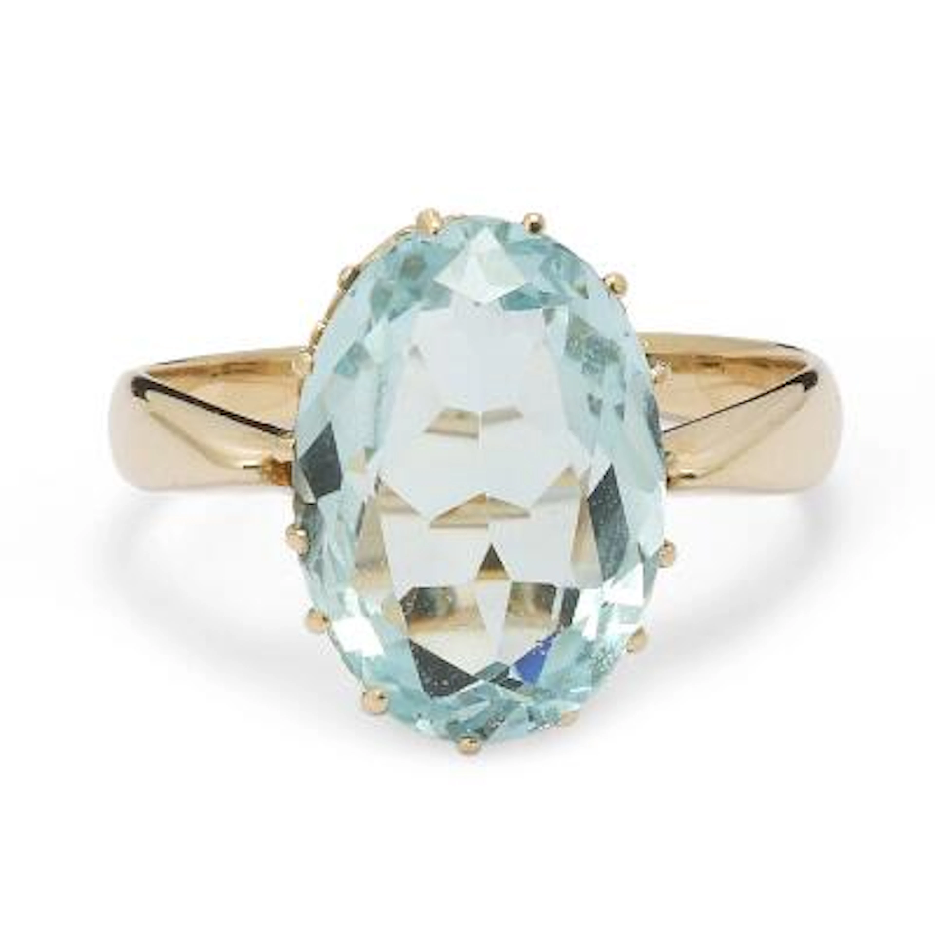 An aquamarine ring set with an oval-cut aquamarine, mounted in 14k