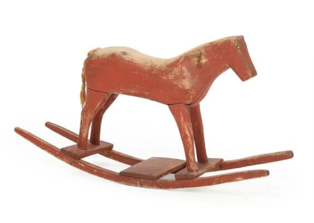 Folk Art rocking horse of carved wood with original red paint. Sweden.