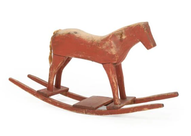 Folk Art rocking horse of carved wood with original red paint. Sweden.