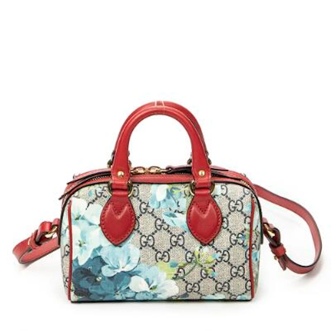 Gucci: A "Mini Boston Crossbody" bag of floral monogram coated canvas
