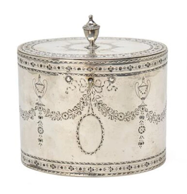 An English George III sterling silver sugar box. Maker Robert Hennell
