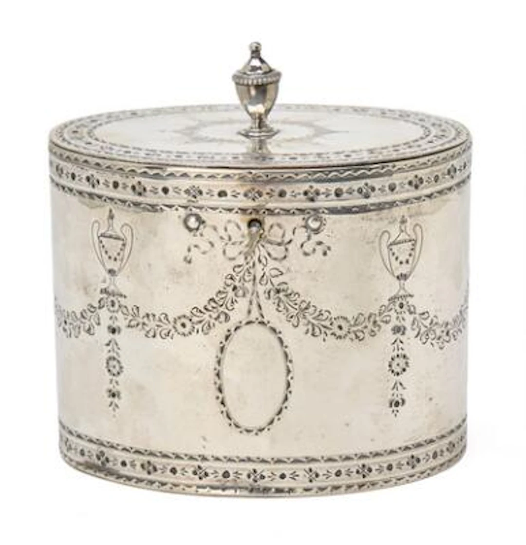 An English George III sterling silver sugar box. Maker Robert Hennell