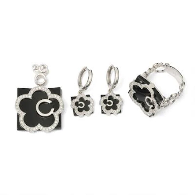 An onyx and diamond jewellery set comprising of a pair of ear pendants
