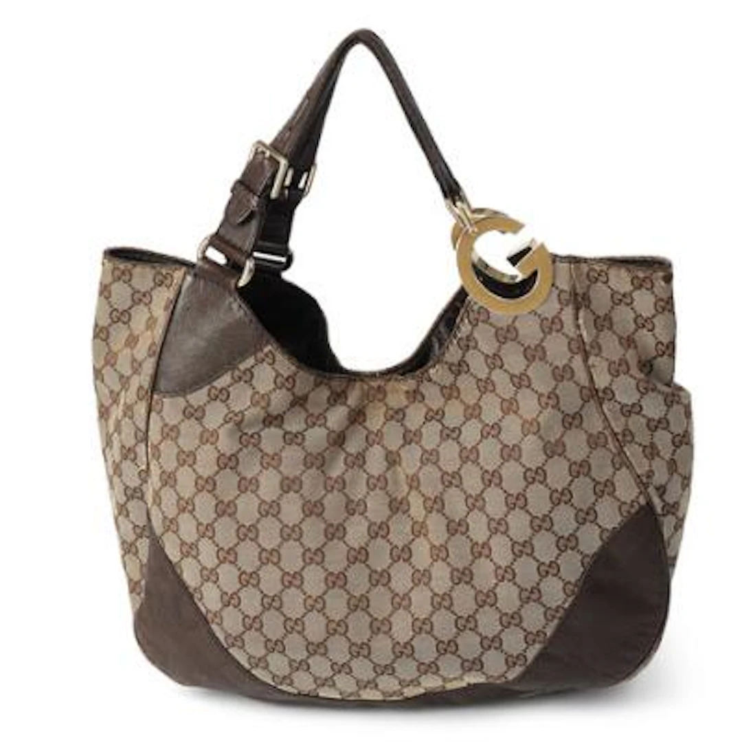 Gucci: “Charlotte Hobo” bag of beige and brown monogram canvas with