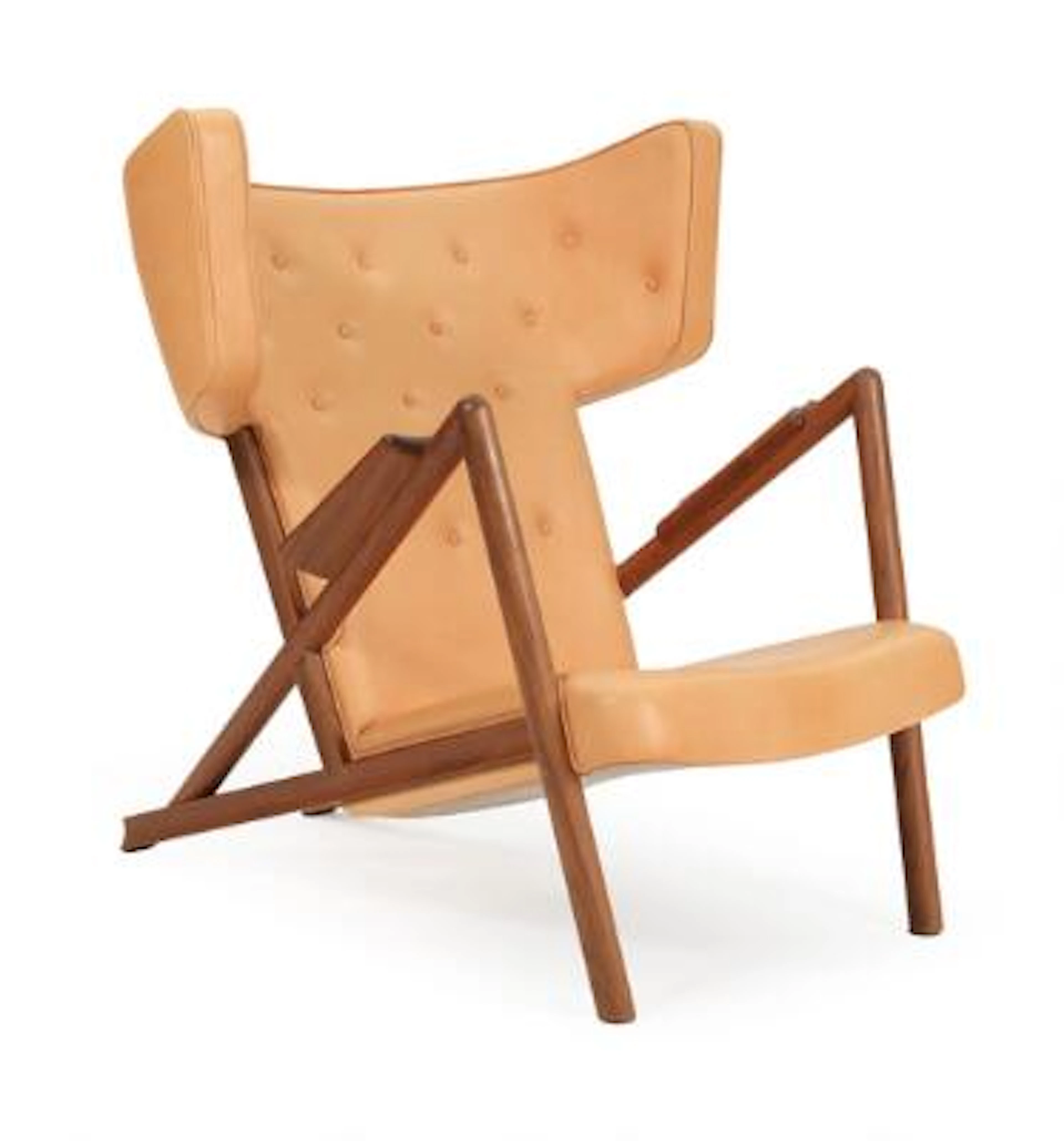 Finn Juhl: "The Grasshopper Chair". Lounge chair with walnut frame