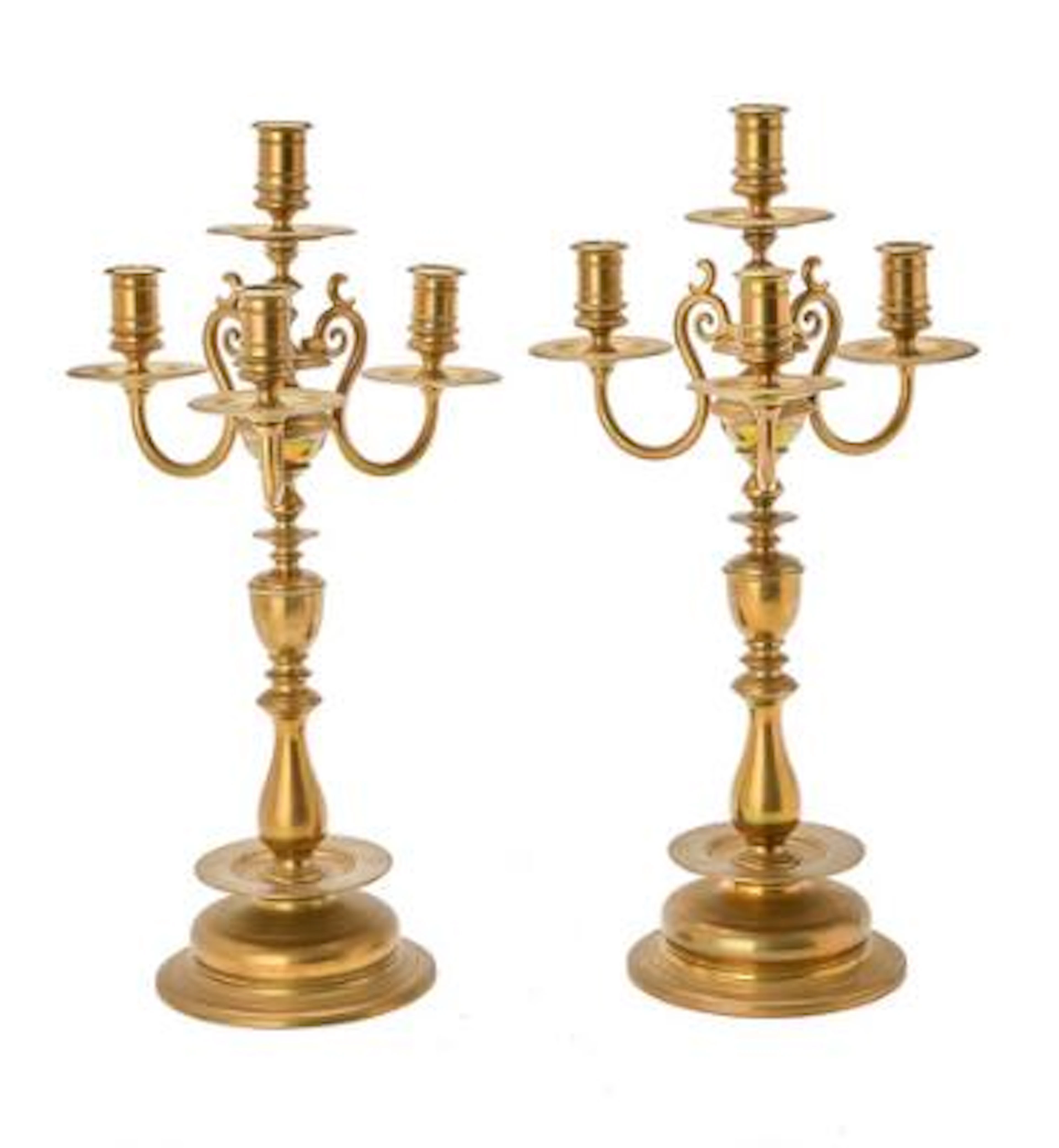 A pair of Baroque style candelabra in brass, Sweden early 20th century.