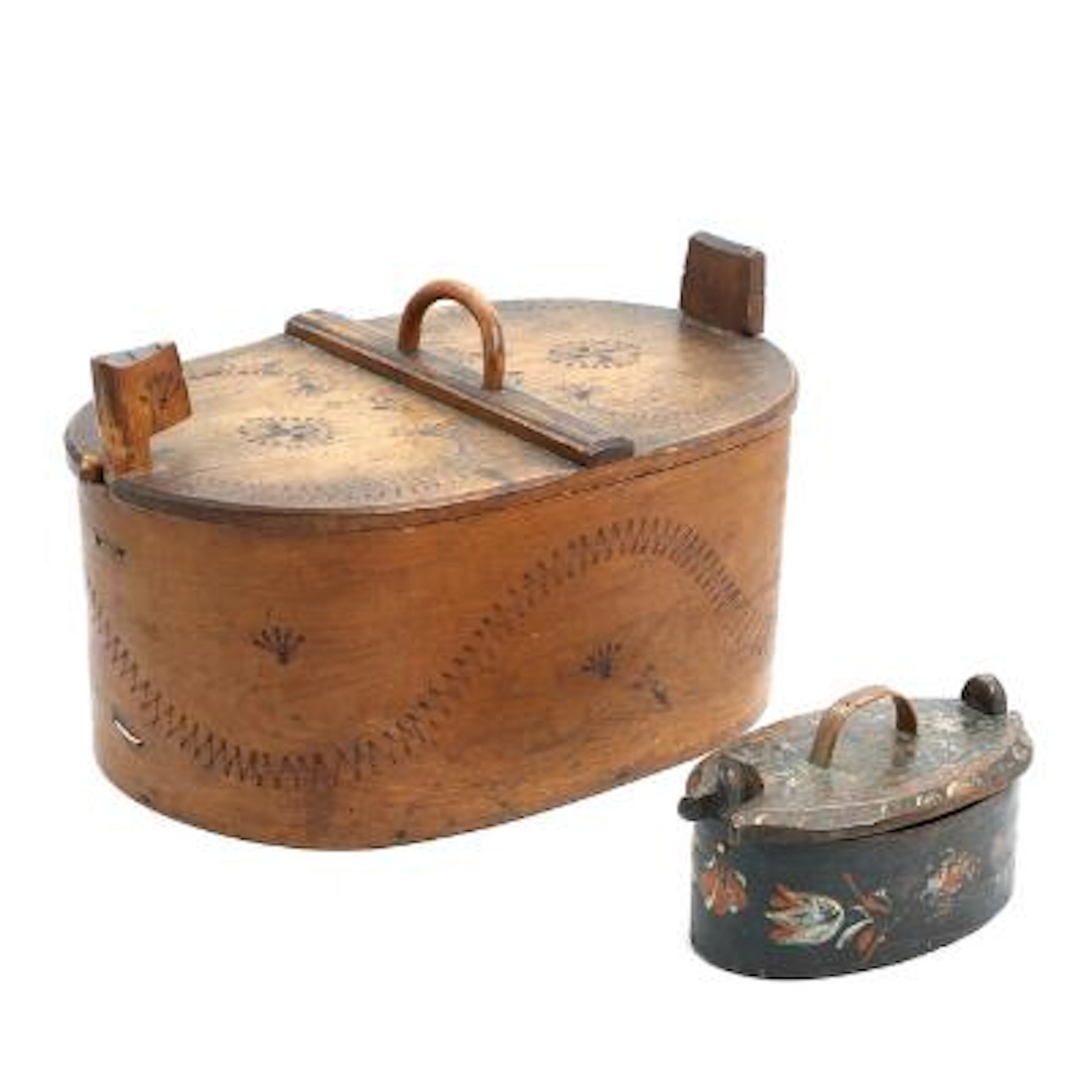 Two wooden tine boxes, the smaller decorated with floral scrolls.