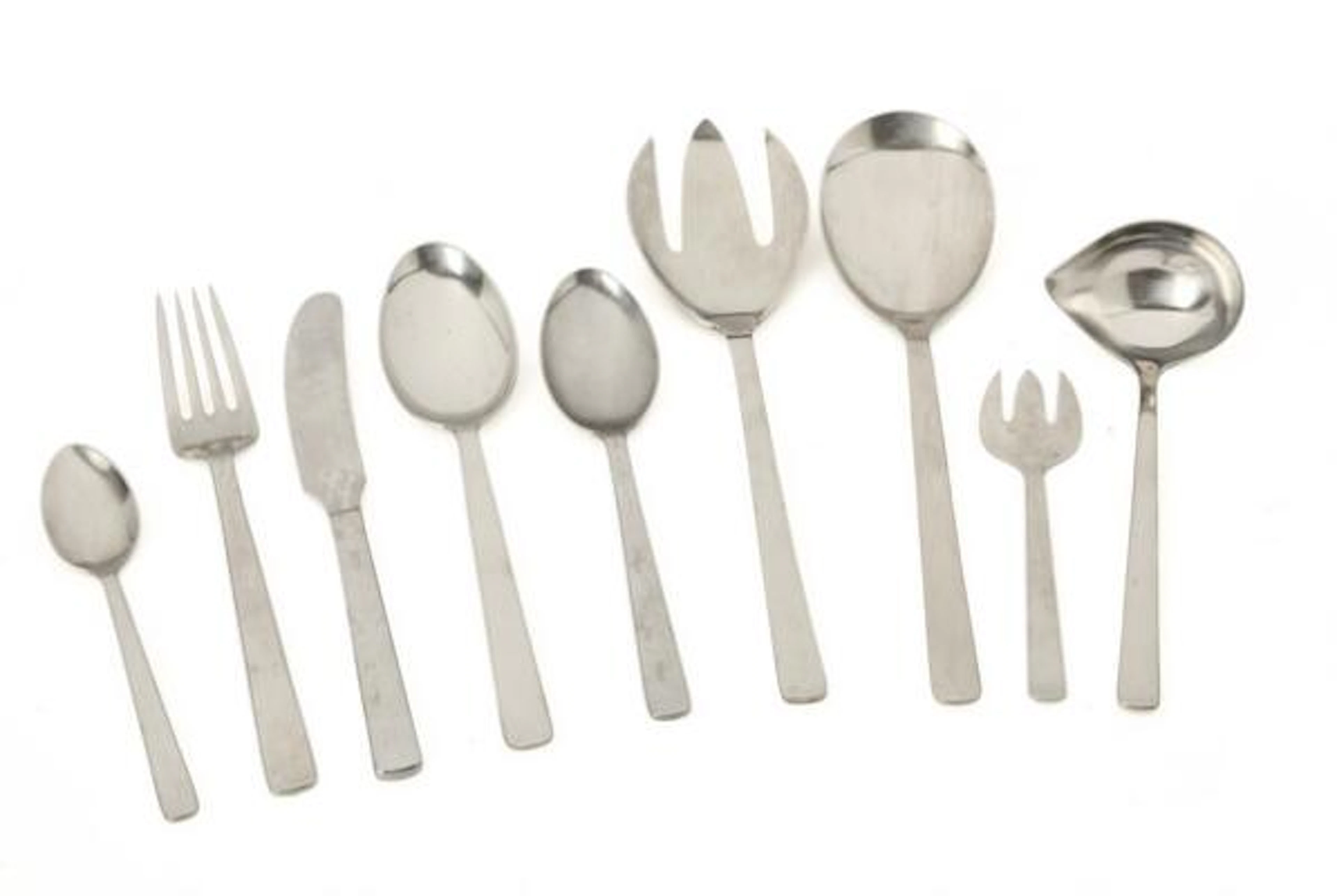 Kay Bojesen: "Grand Prix". Cutlery and some serving pieces of stainless
