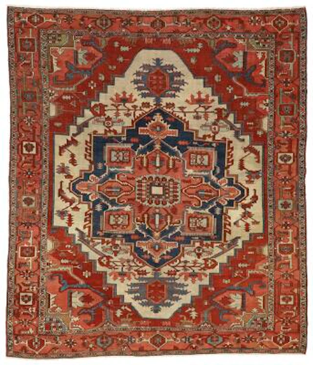 An antique Serapi carpet, North West Persia. Stylized medallion design