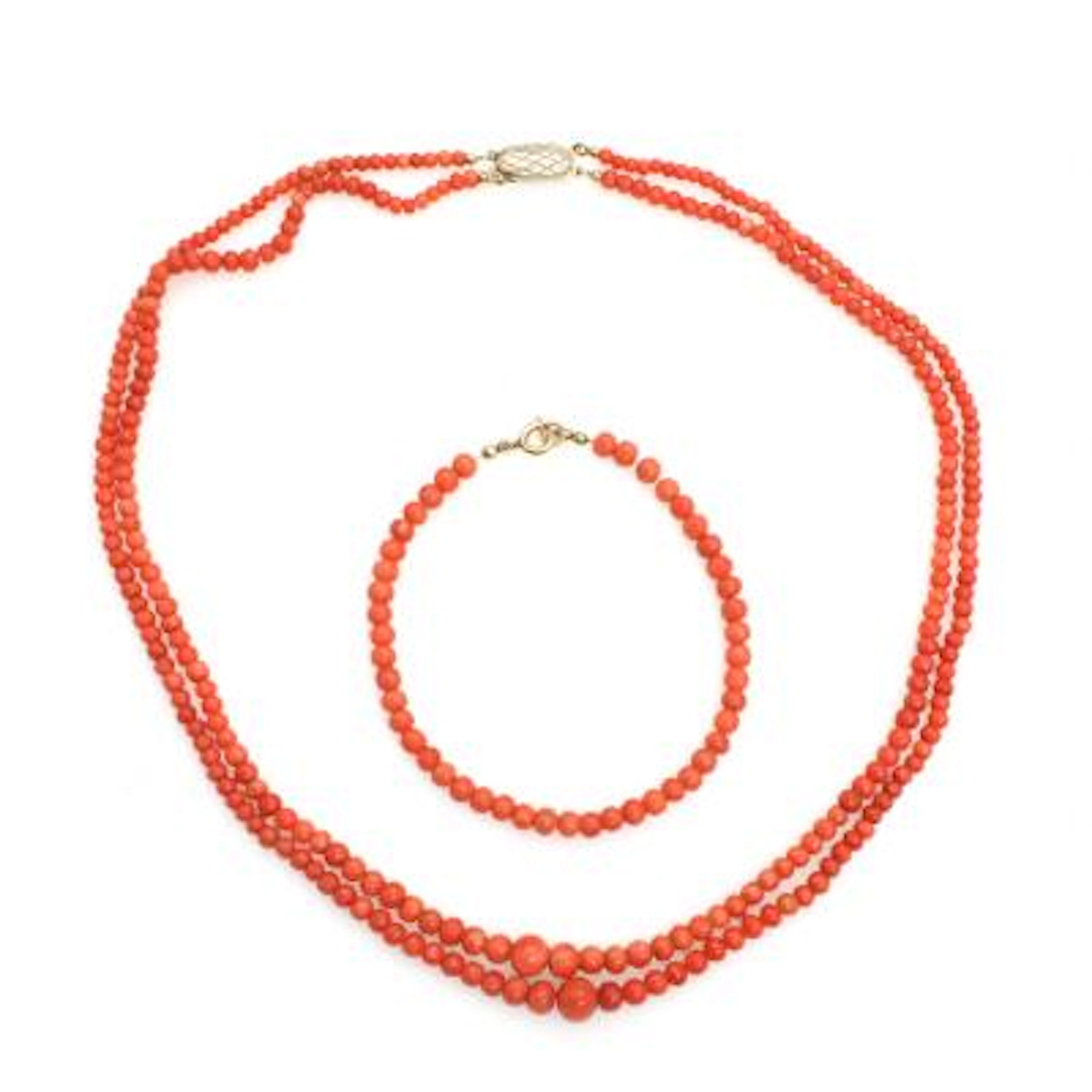 A two-strand coral necklace and a bracelet with clasps of gilt sterling