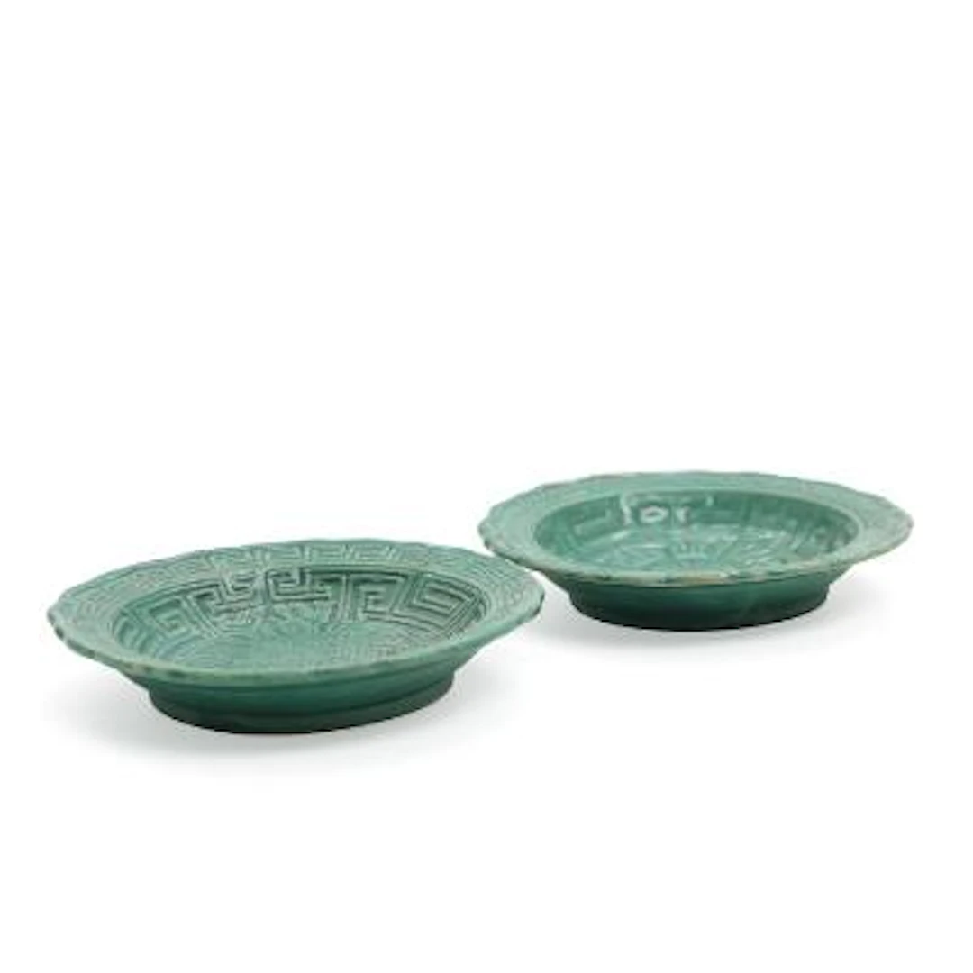 Two small Chinese stoneware plates with impressed ornamentation. 19th-20th