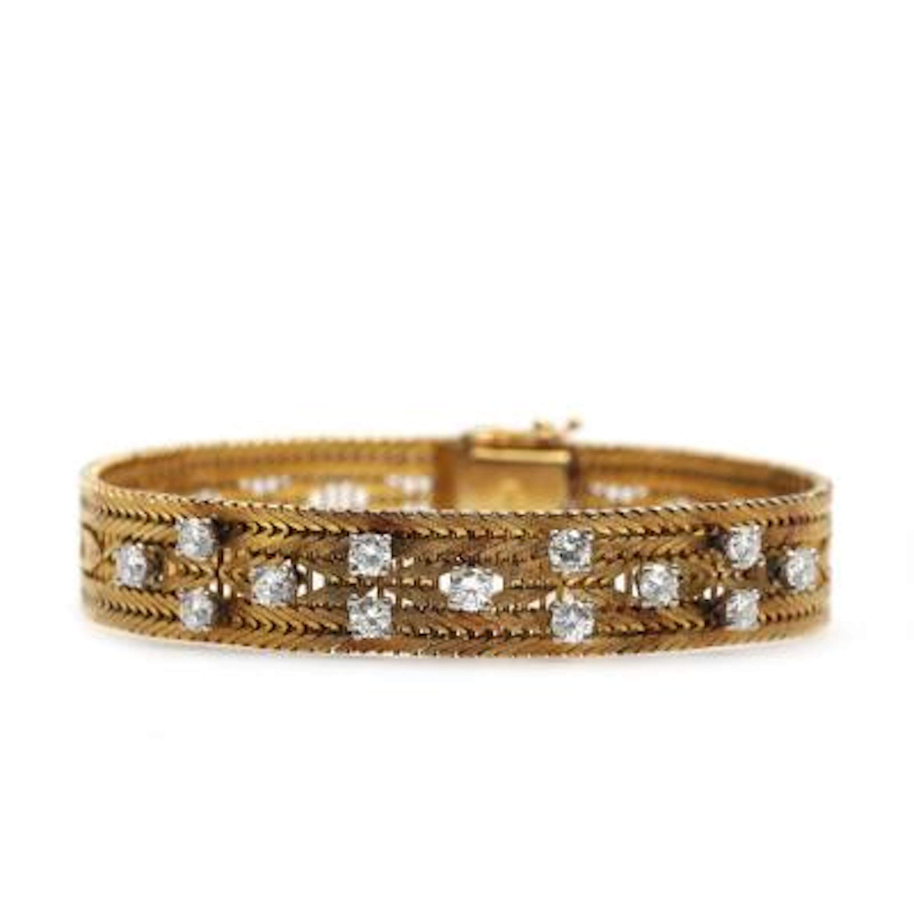 A diamond bracelet set with numerous brilliant-cut diamonds weighing