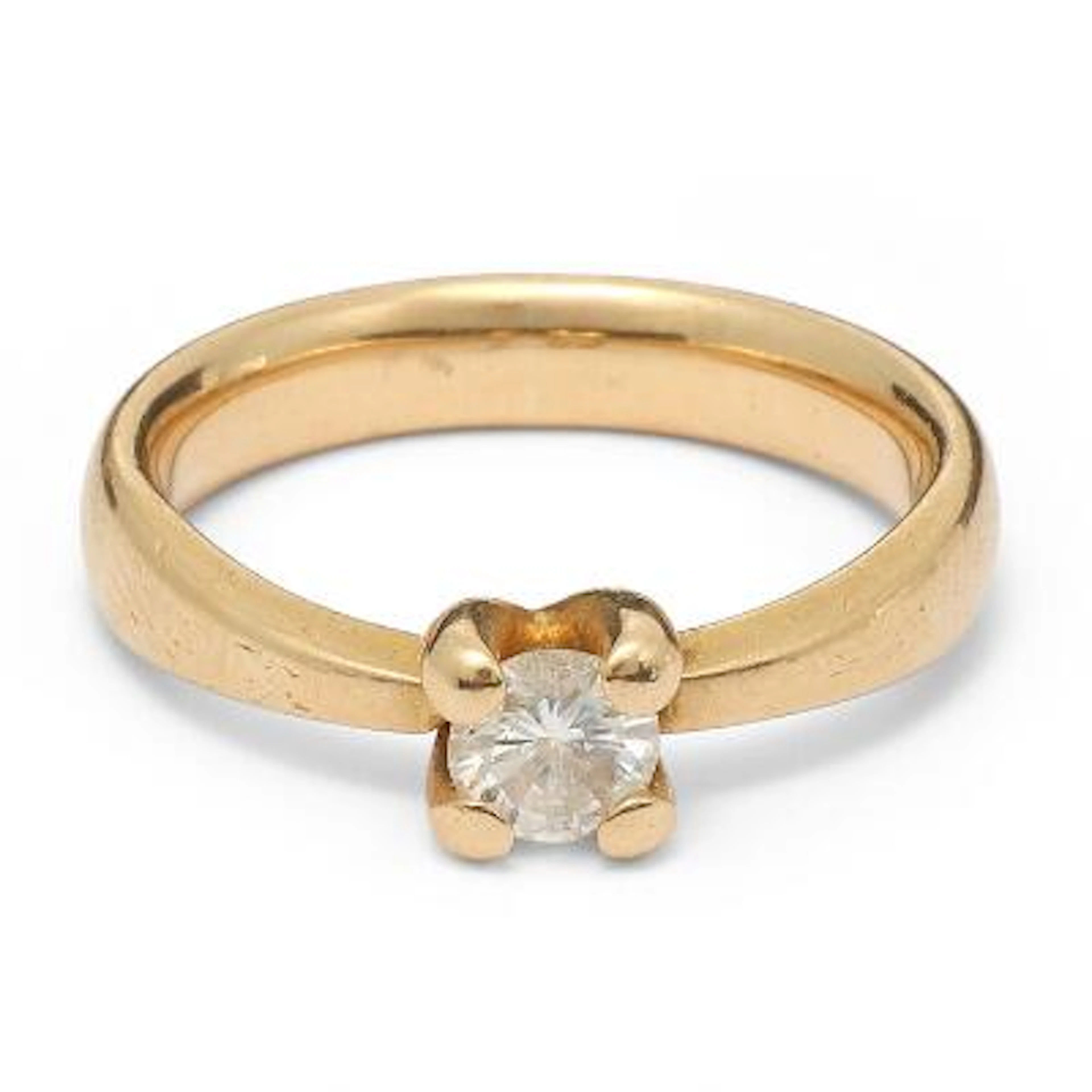 A solitaire diamond ring set with a brilliant-cut diamond, mounted