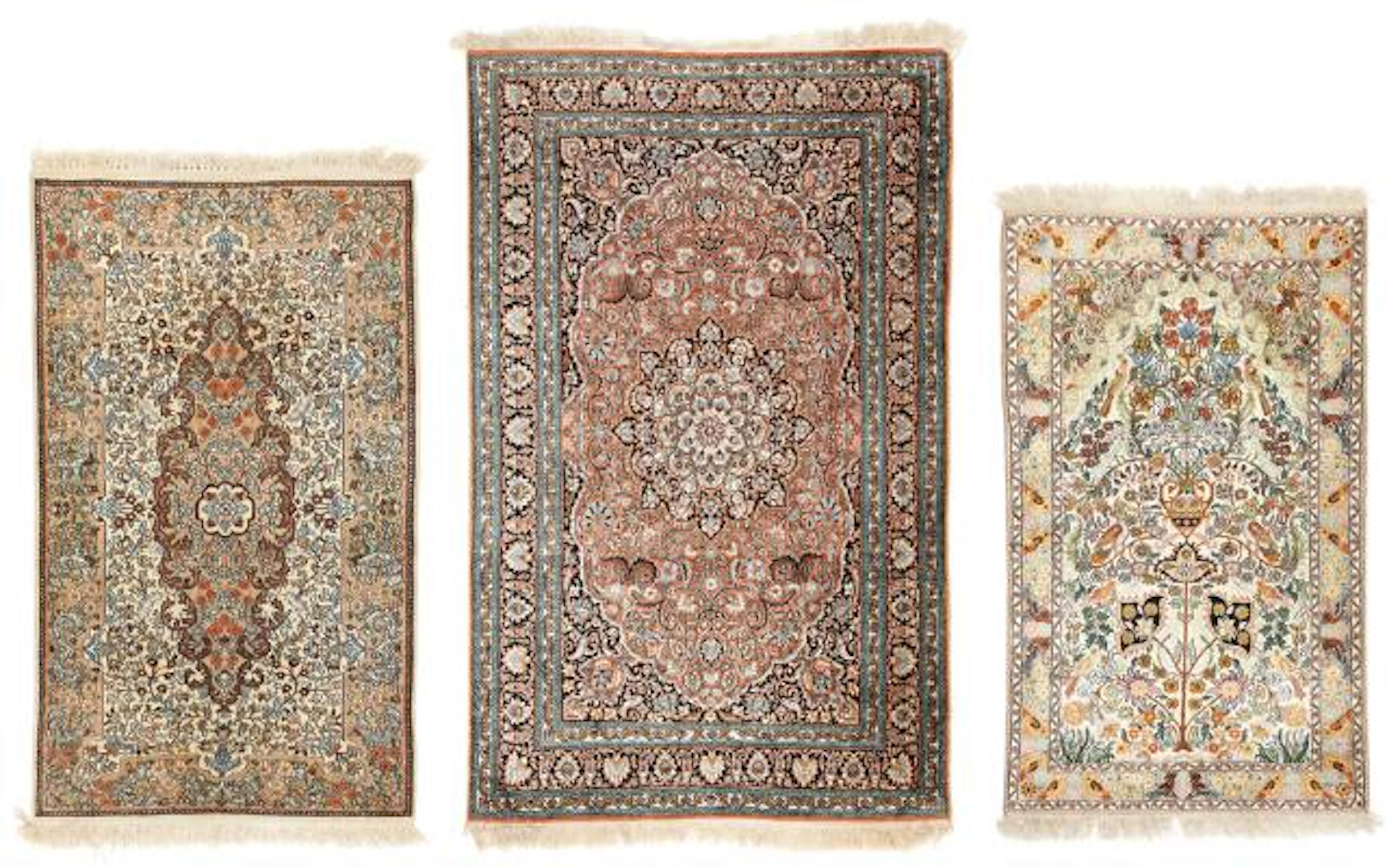 Three Kasmir silk rugs, India. 158 x 94 cm. 186 x 116 cm. 149 x 87