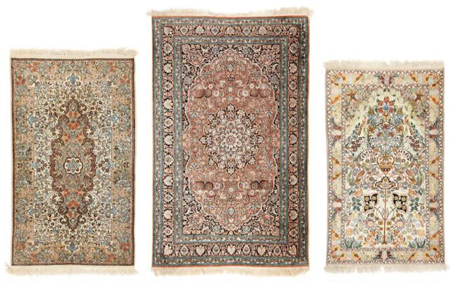 Three Kasmir silk rugs, India. 158 x 94 cm. 186 x 116 cm. 149 x 87