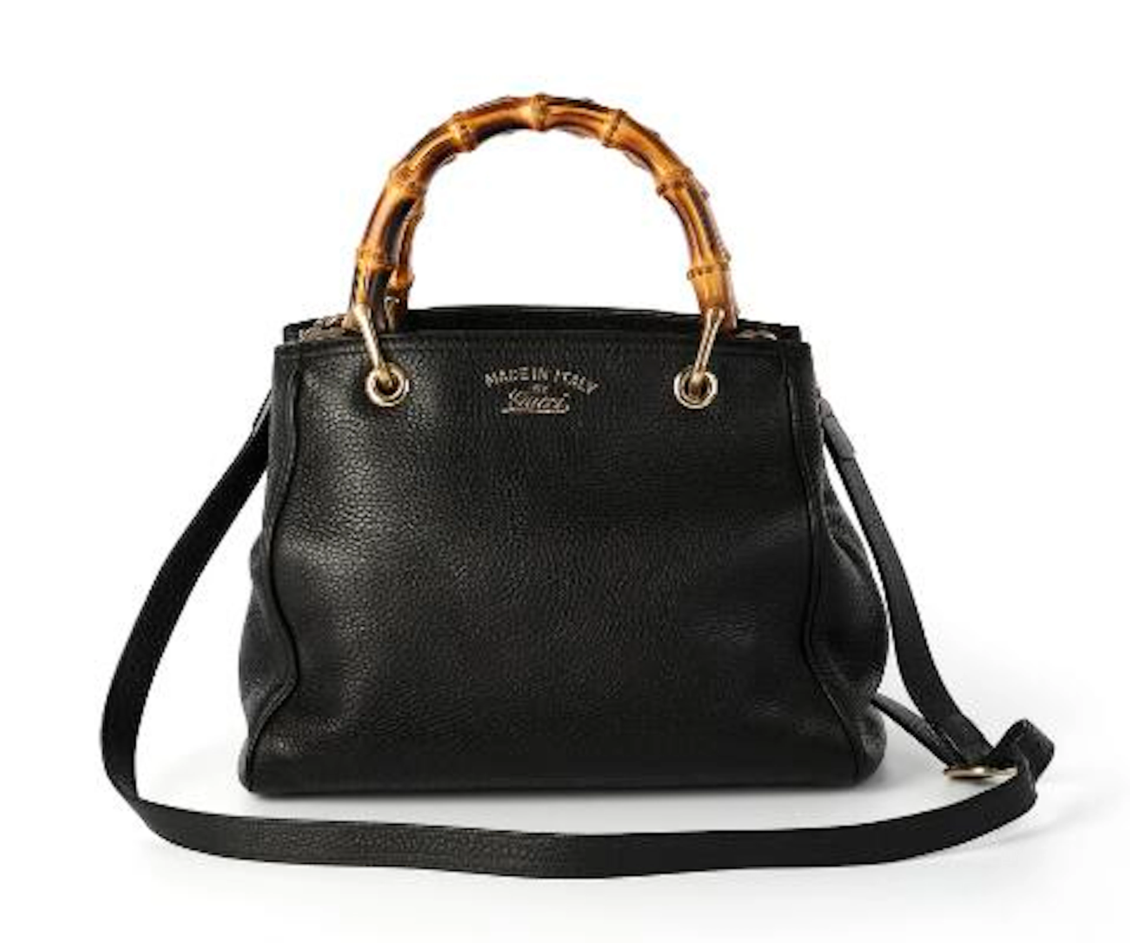 Gucci: A bag of black leather with gold tone hardware, two bamboo