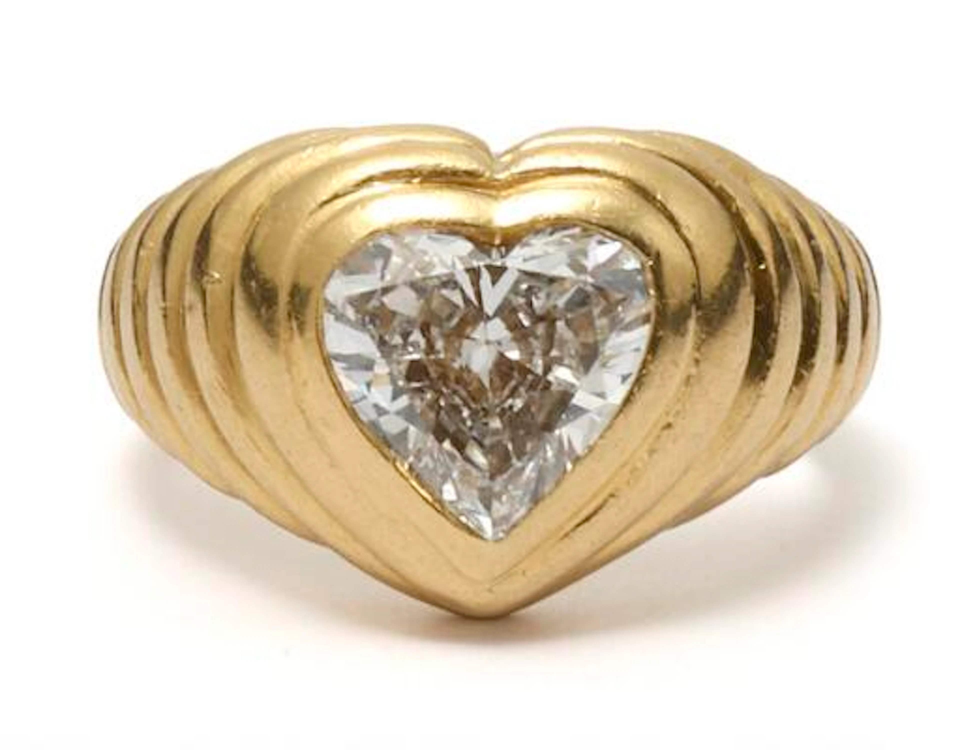 Bulgari: A diamond ring set with a heart-shaped diamond, mounted in