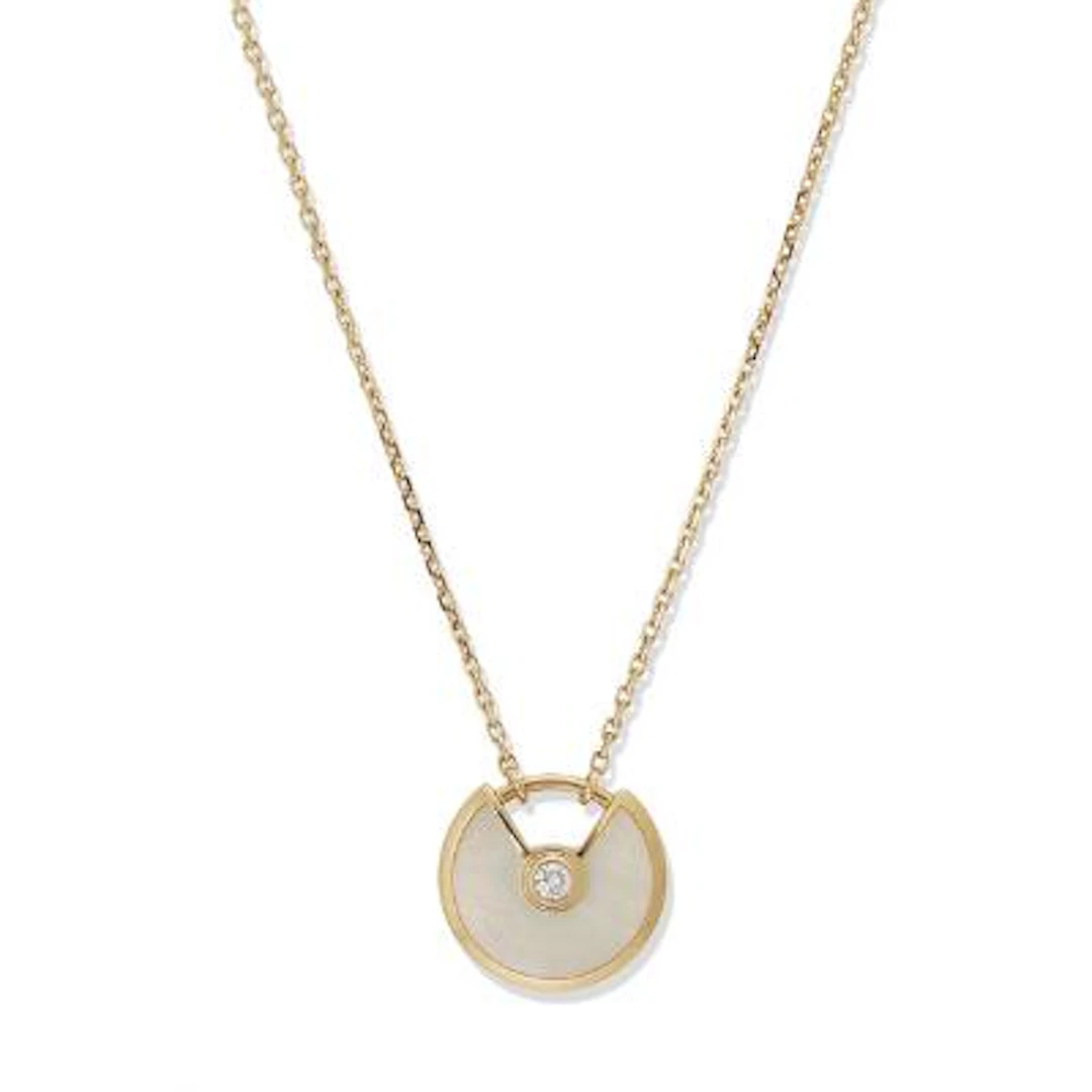 Cartier: A "Amulette de Cartier" necklace set with a pendant, mounted