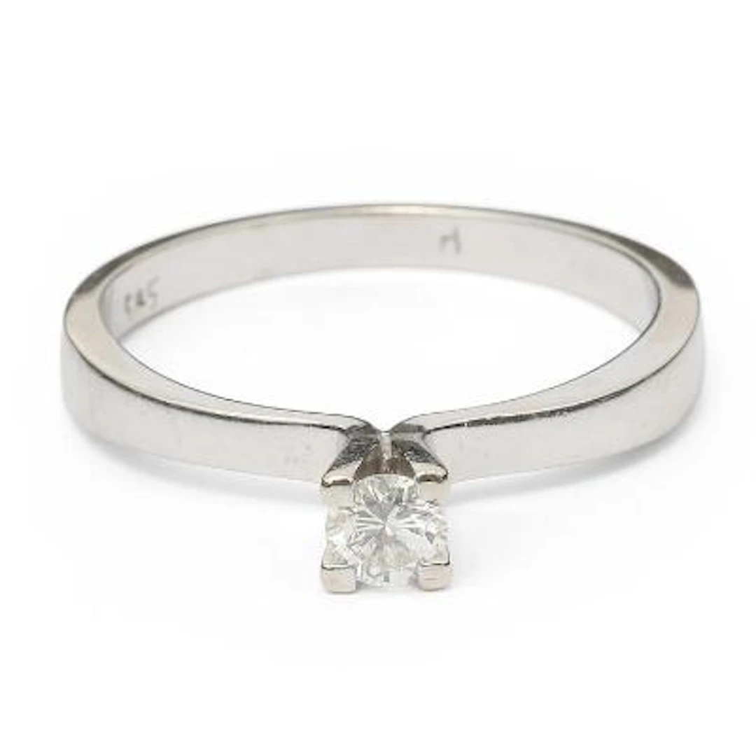 A solitaire diamond ring set with a brilliant-cut diamond, mounted