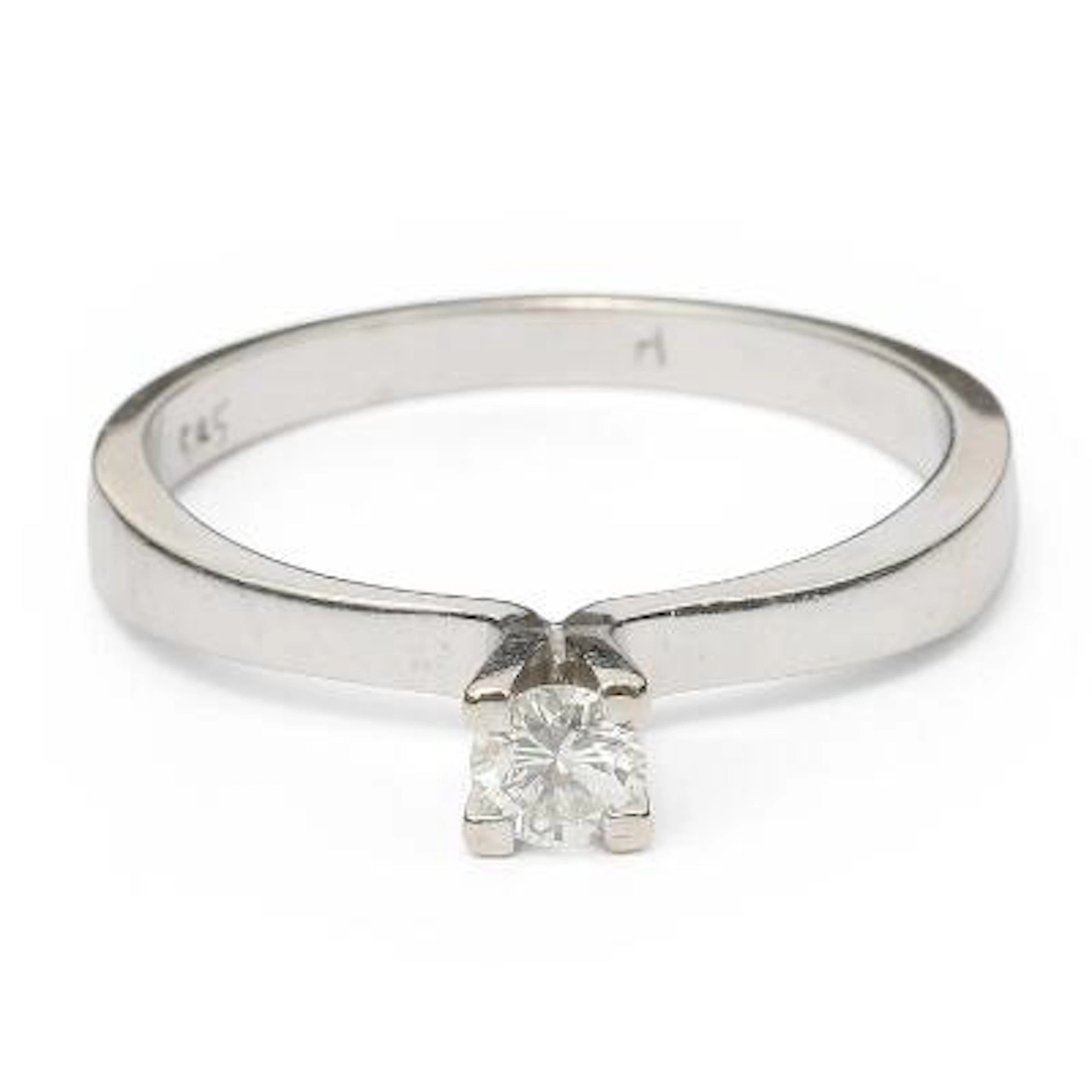 A solitaire diamond ring set with a brilliant-cut diamond, mounted