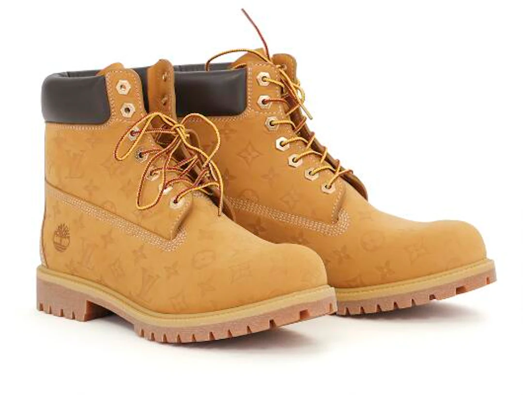 Louis Vuitton: A pair of Limited Edition boots of light brown monogram